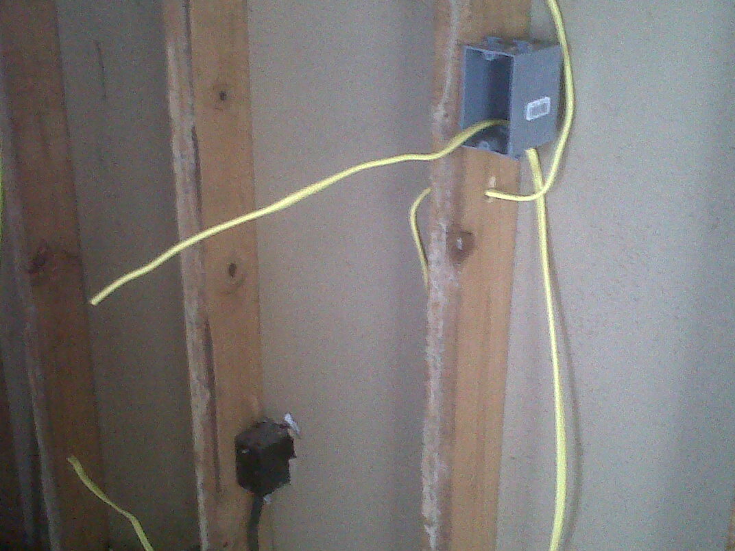 Exposed wires in bedroom