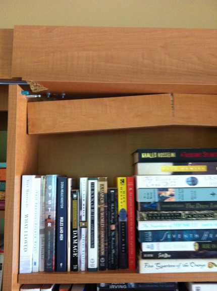 Collapsed bookshelf unit