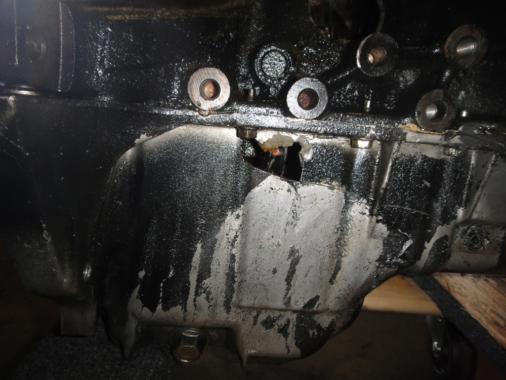 Hole in fraudulent engine 