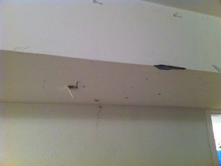 Wall gouged and screws in walls