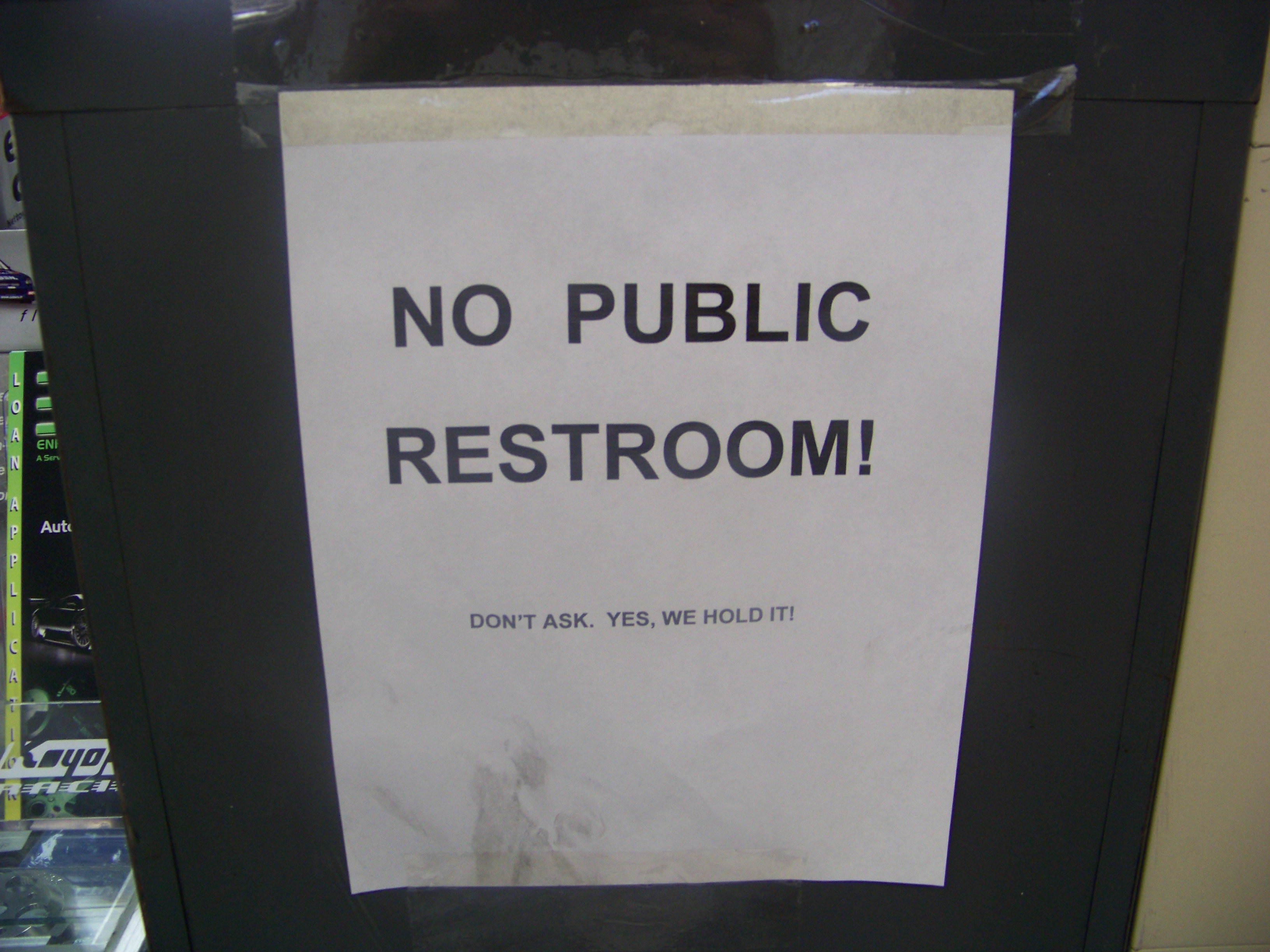 Photo of sign stating no public restroom