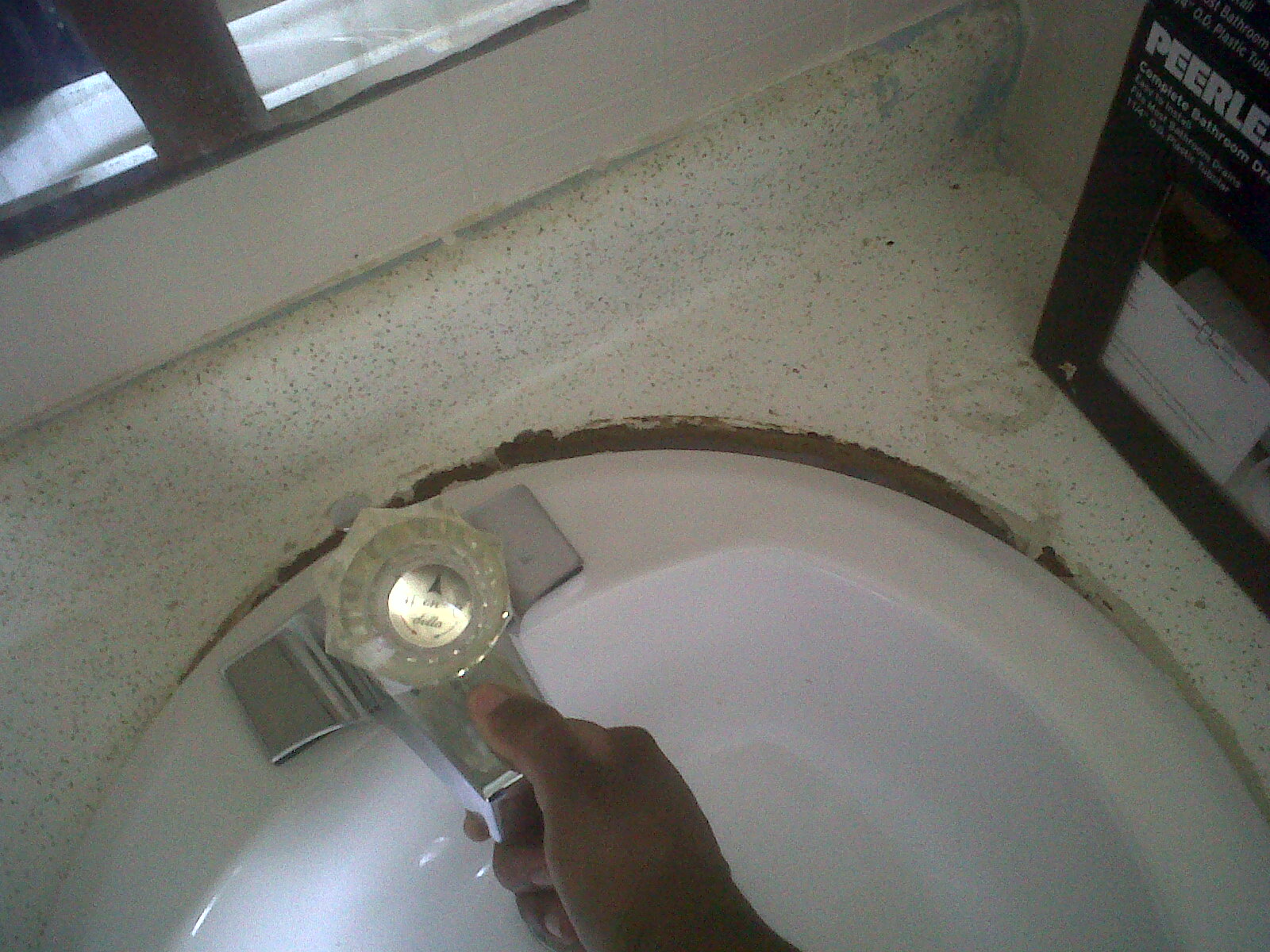 Sink affixed with plumbers putty loose