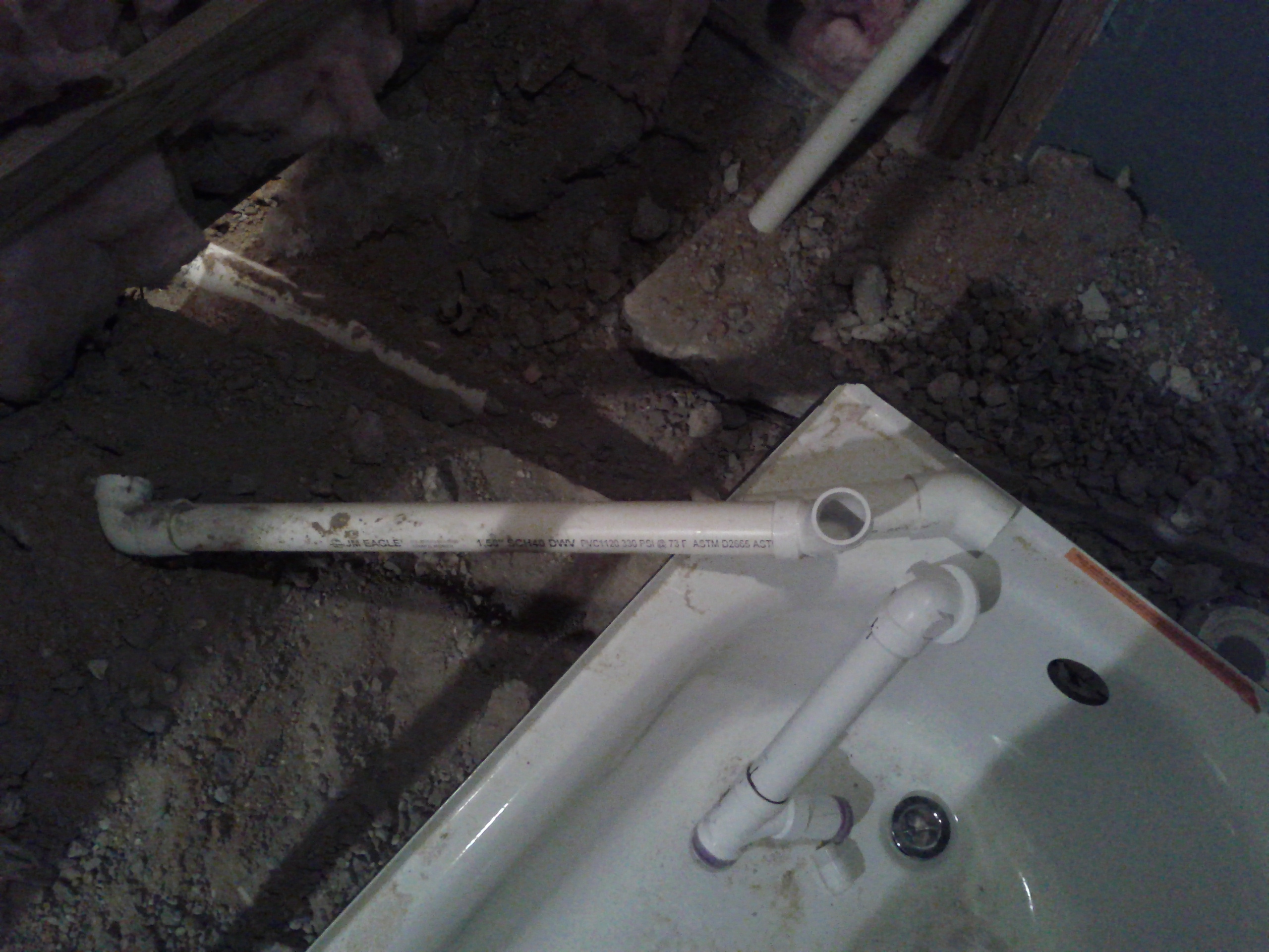 picture of the drain pipes that were burried and not glued 