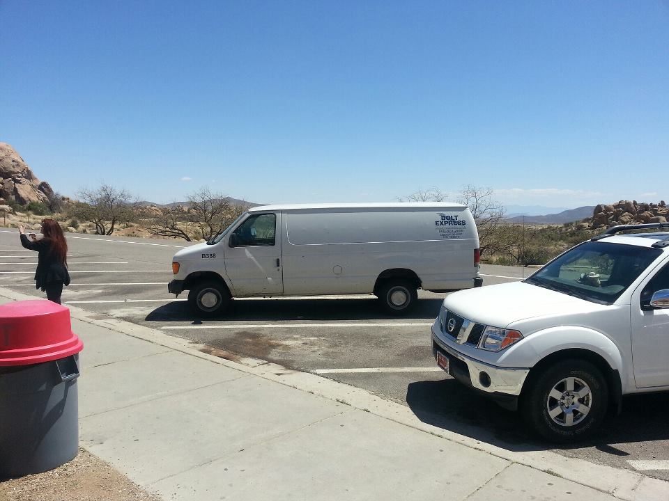 Tom Raspotnik White Conversion Van with couch in back for when he picks up children