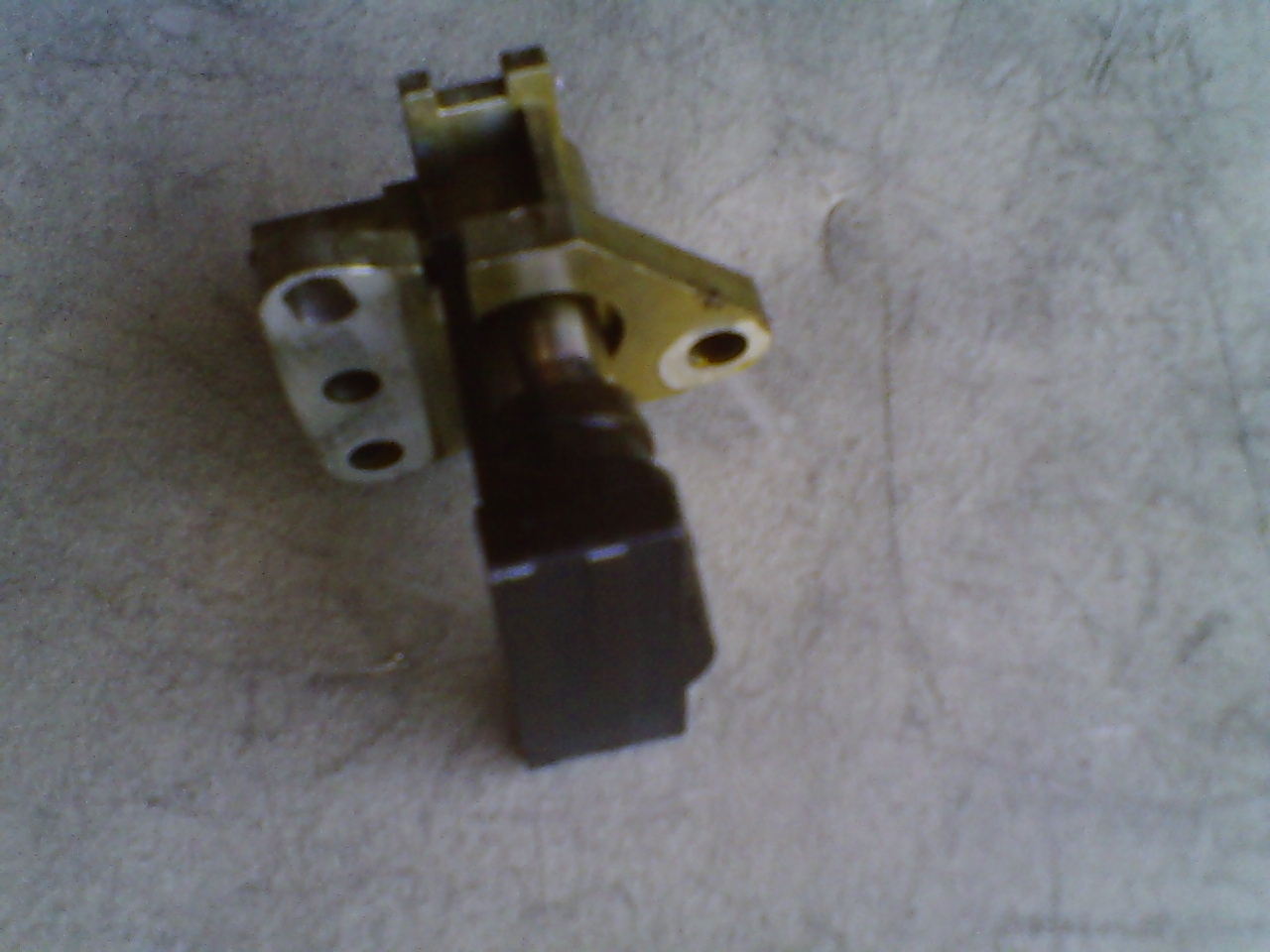 The timing chain guide / tensioner that needed to be replaced. This part is not included in head gasket relacement.