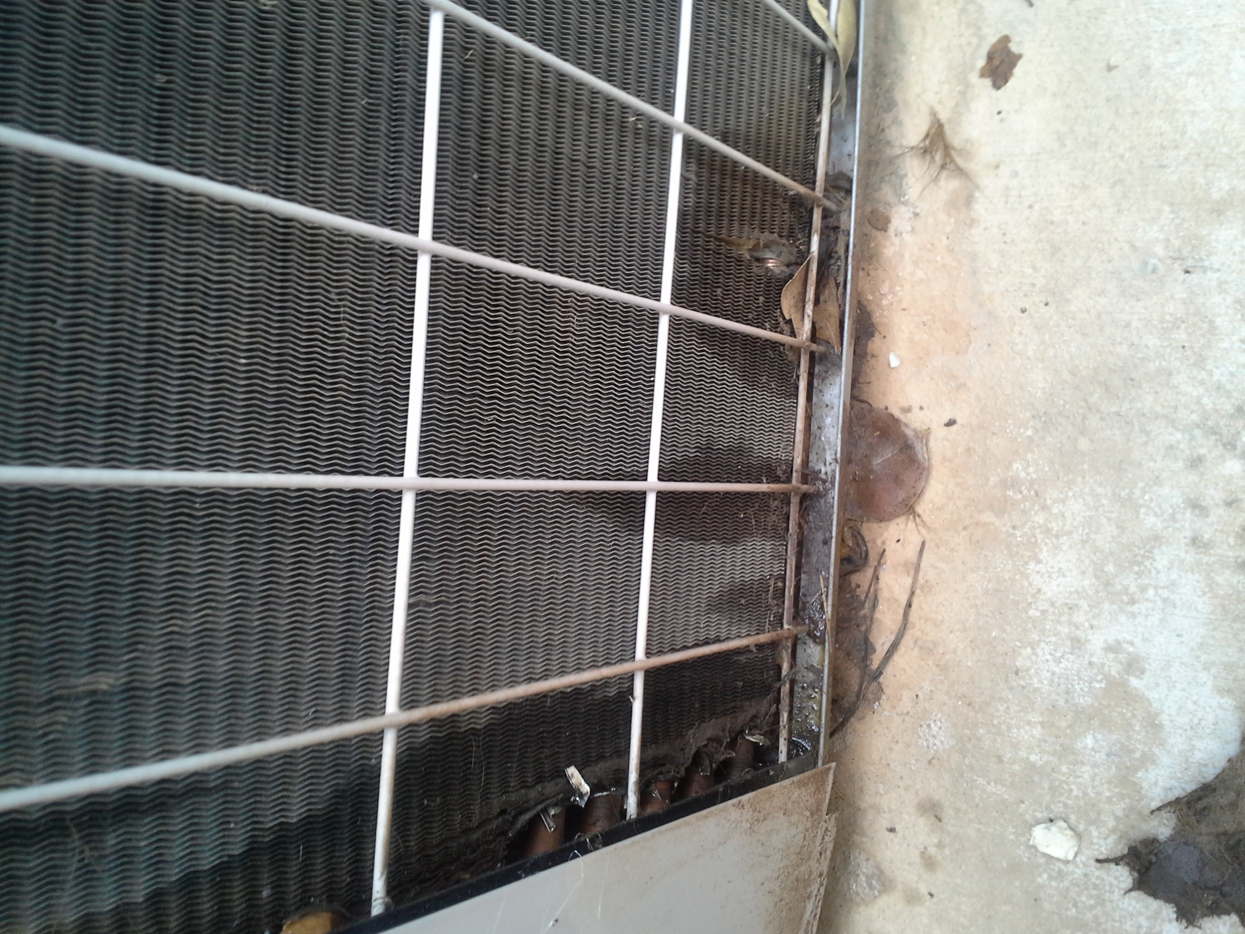 Damage to air conditioning unit with leak. 