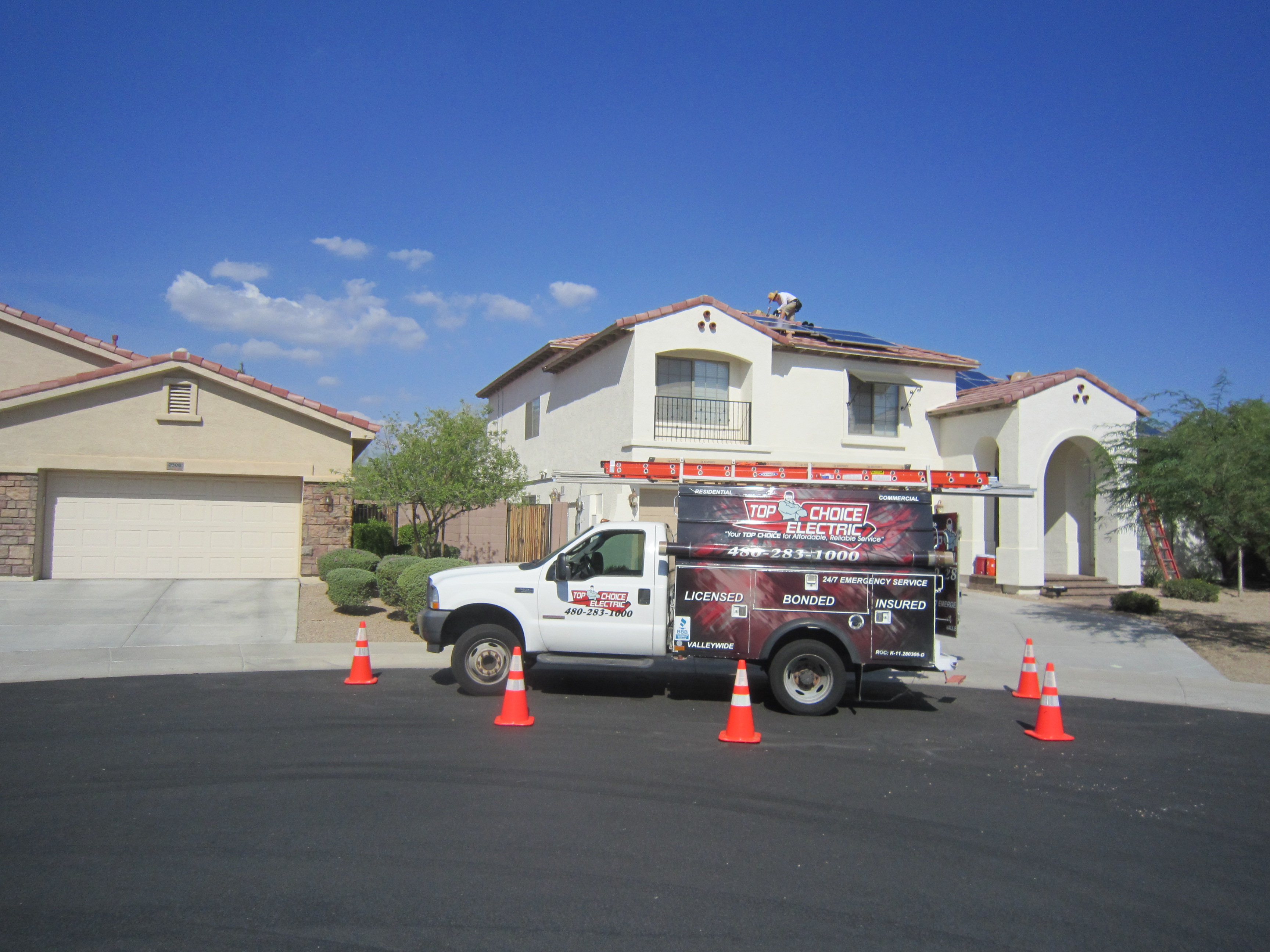 Top Choice Solar - Sale # 1 for new solar company front of house with top choice elect truck out front.