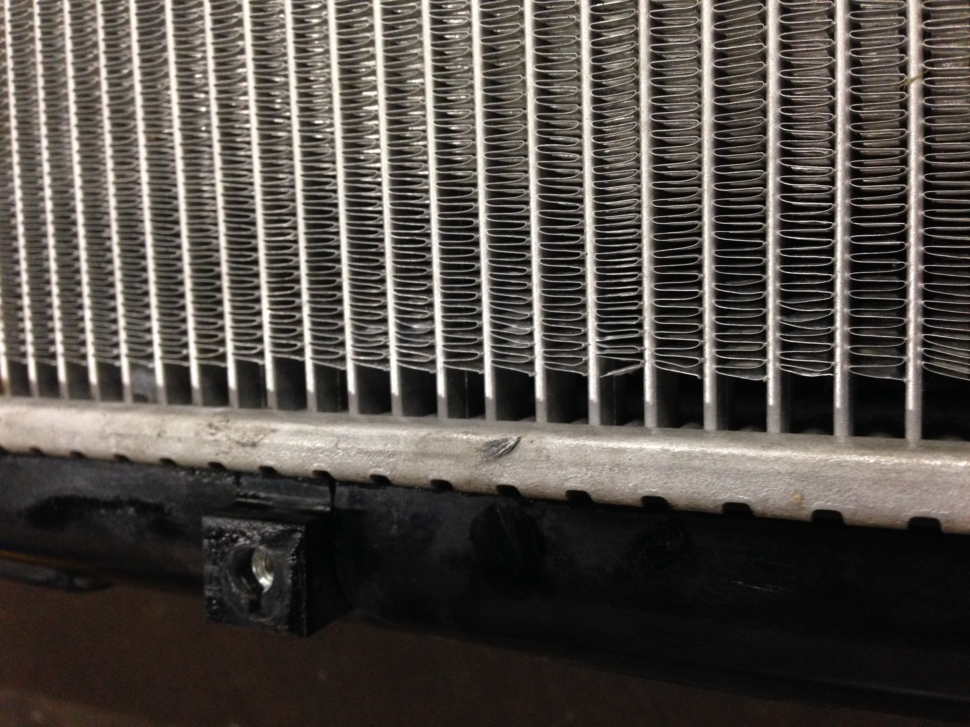 The brand new crack in the radiator is center. 