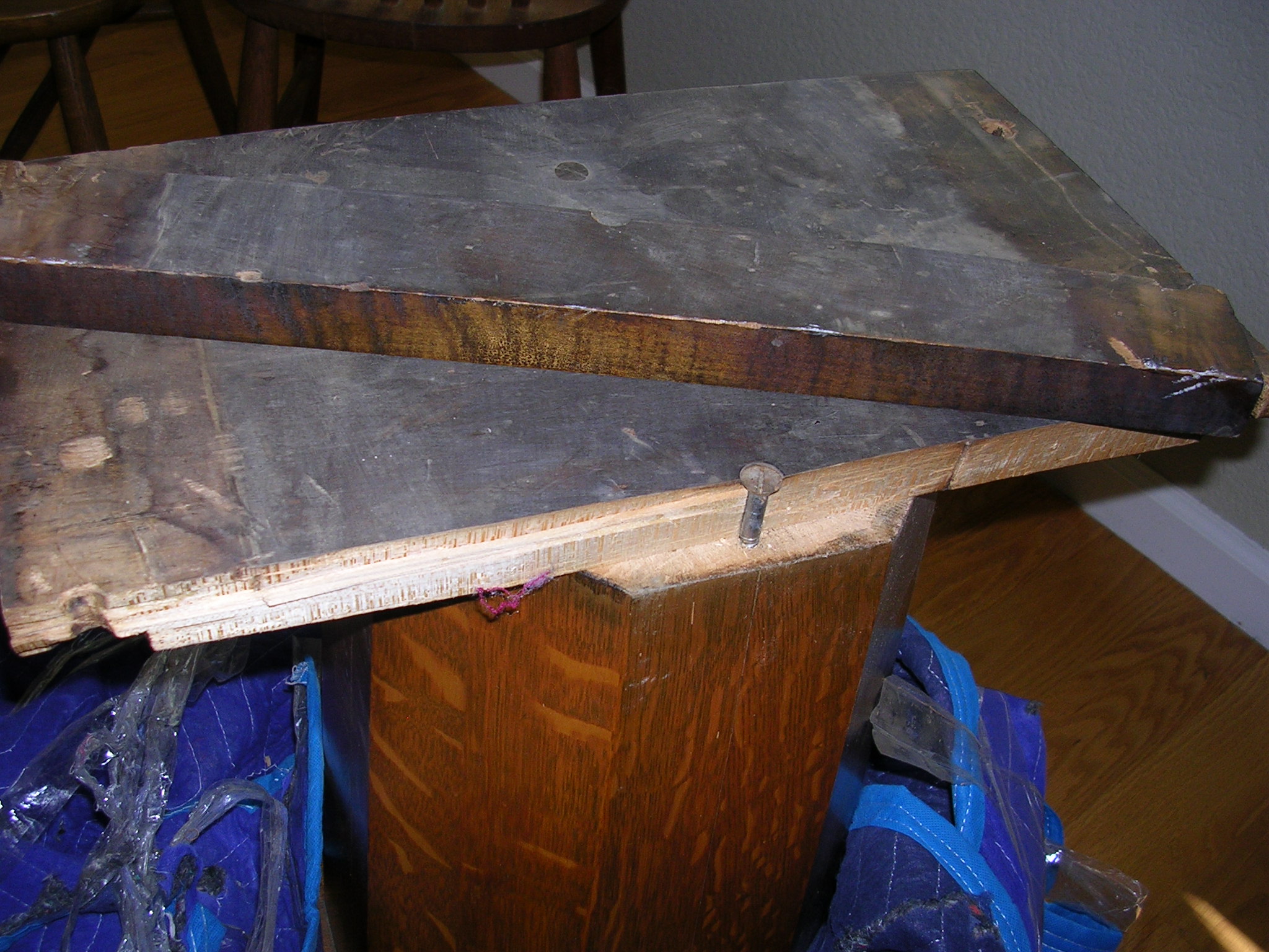Broken base of oak table