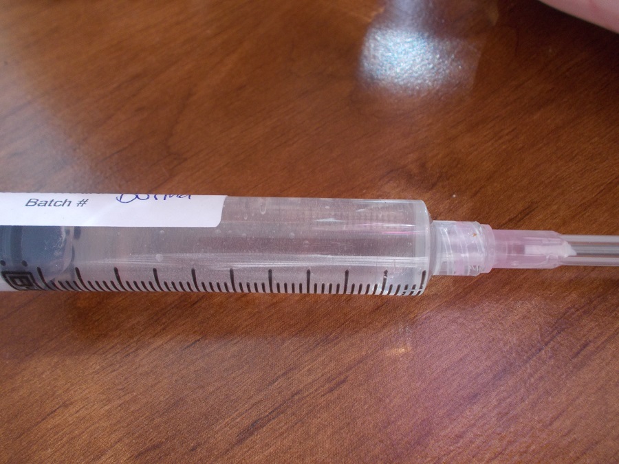 crystal clear tap water syringe