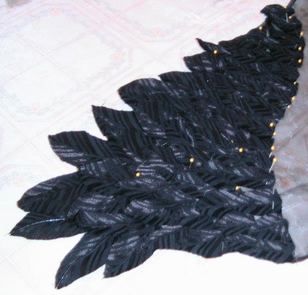 in addition to 2 pirate shirts I assembled for donated materials I also made a wing tunic

No one else makes fake feathers like these *(YET)

I designed machine washable fake feathers the How to guide