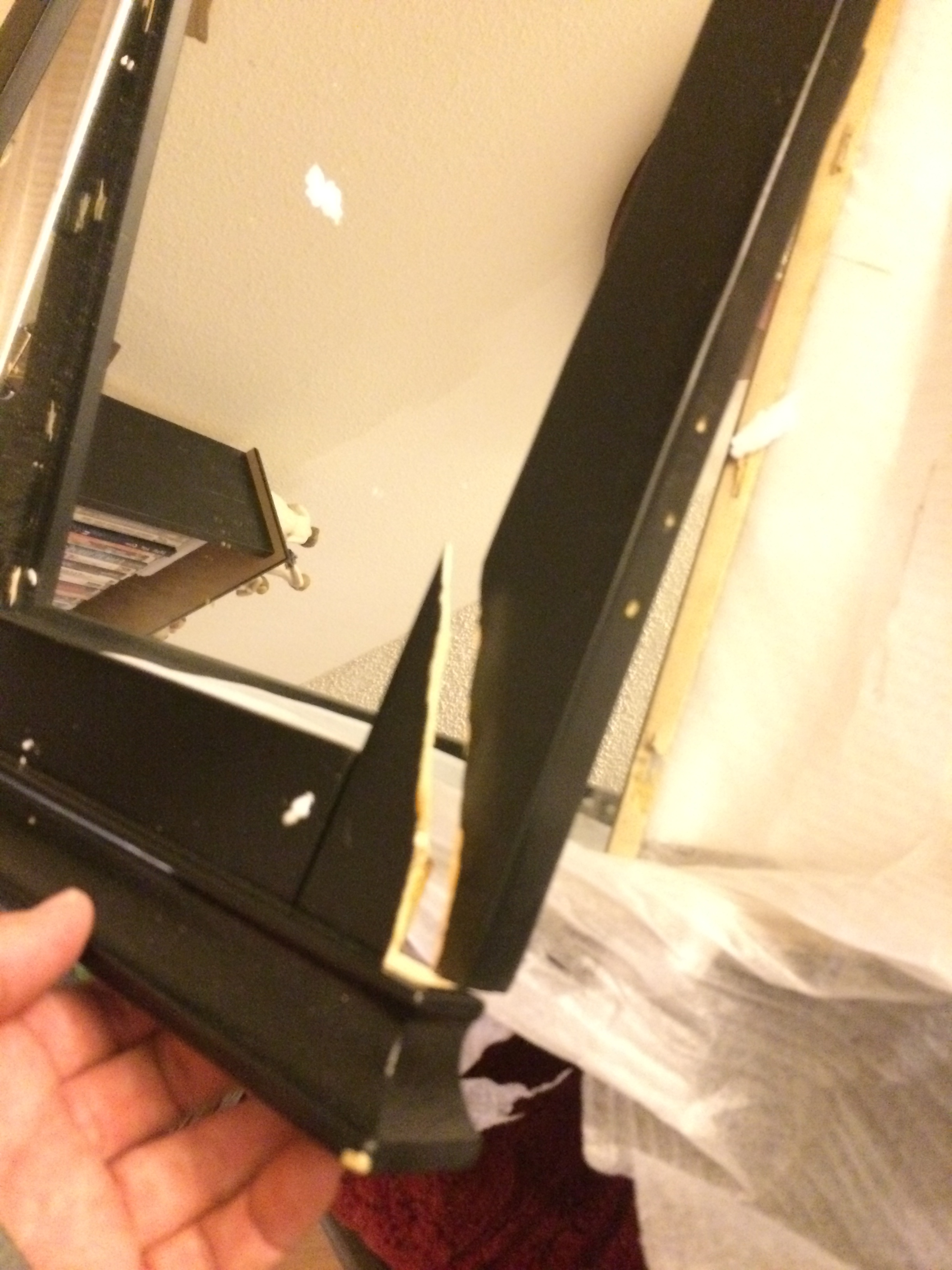 This is the replacement I received.  Note it is only the center portion of the three piece mirror.