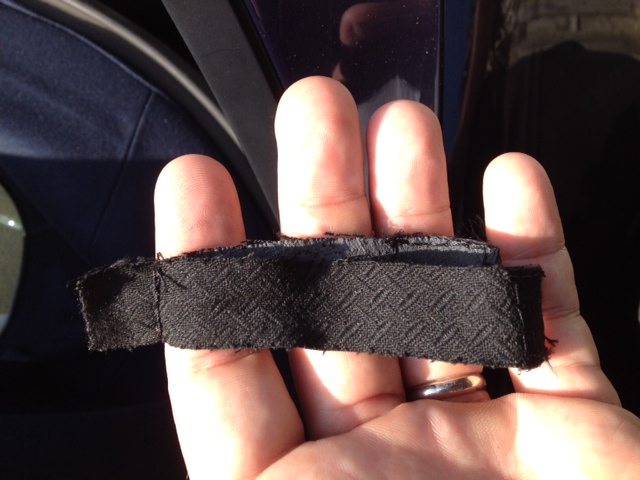 Here's one photo of the original velcro strap after it came loose from the top. You will notice that it is stitched so that the gummy rubberized side of the strap faces inward (against the metal frame