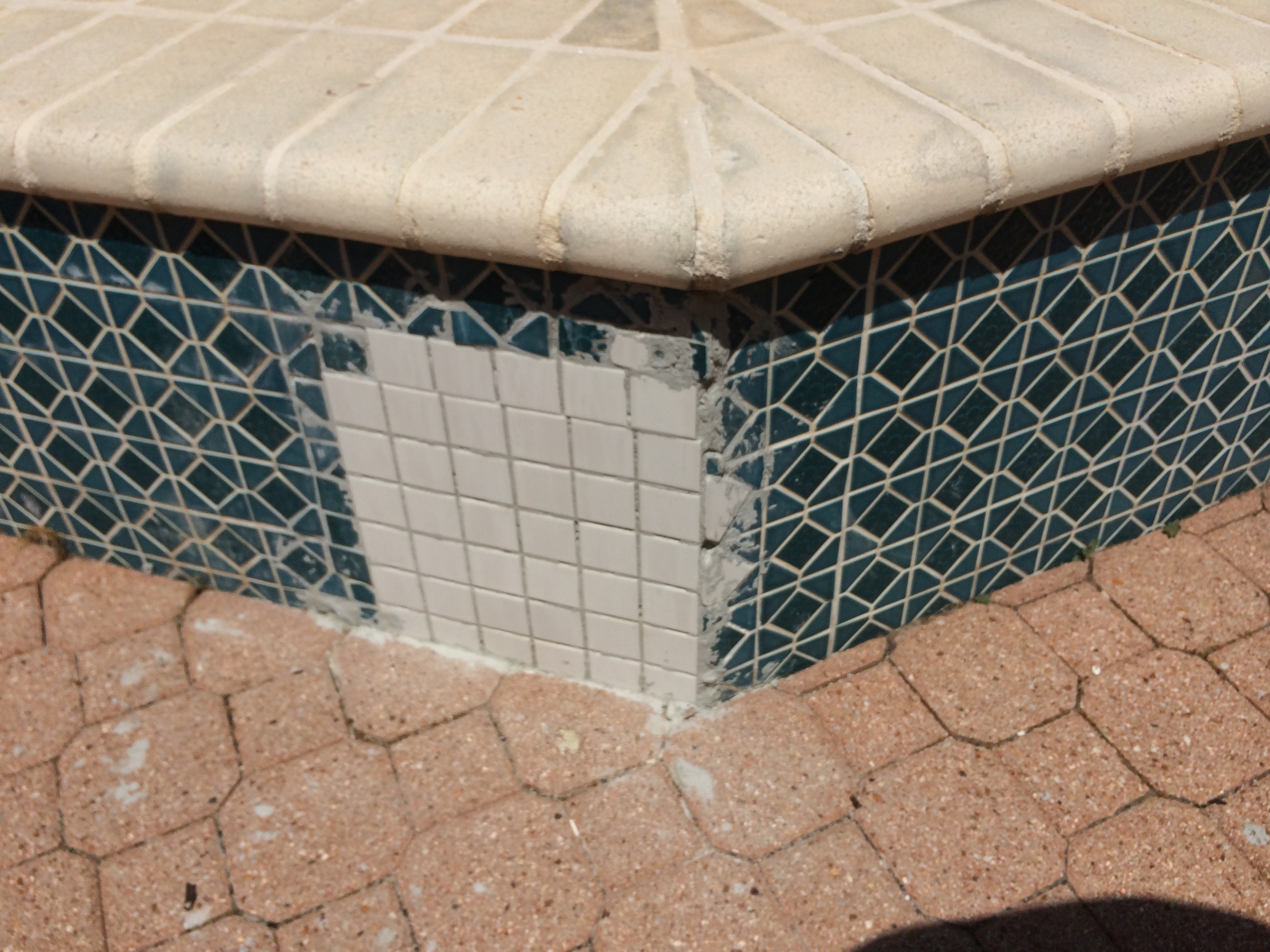 More bad pool tile repairs