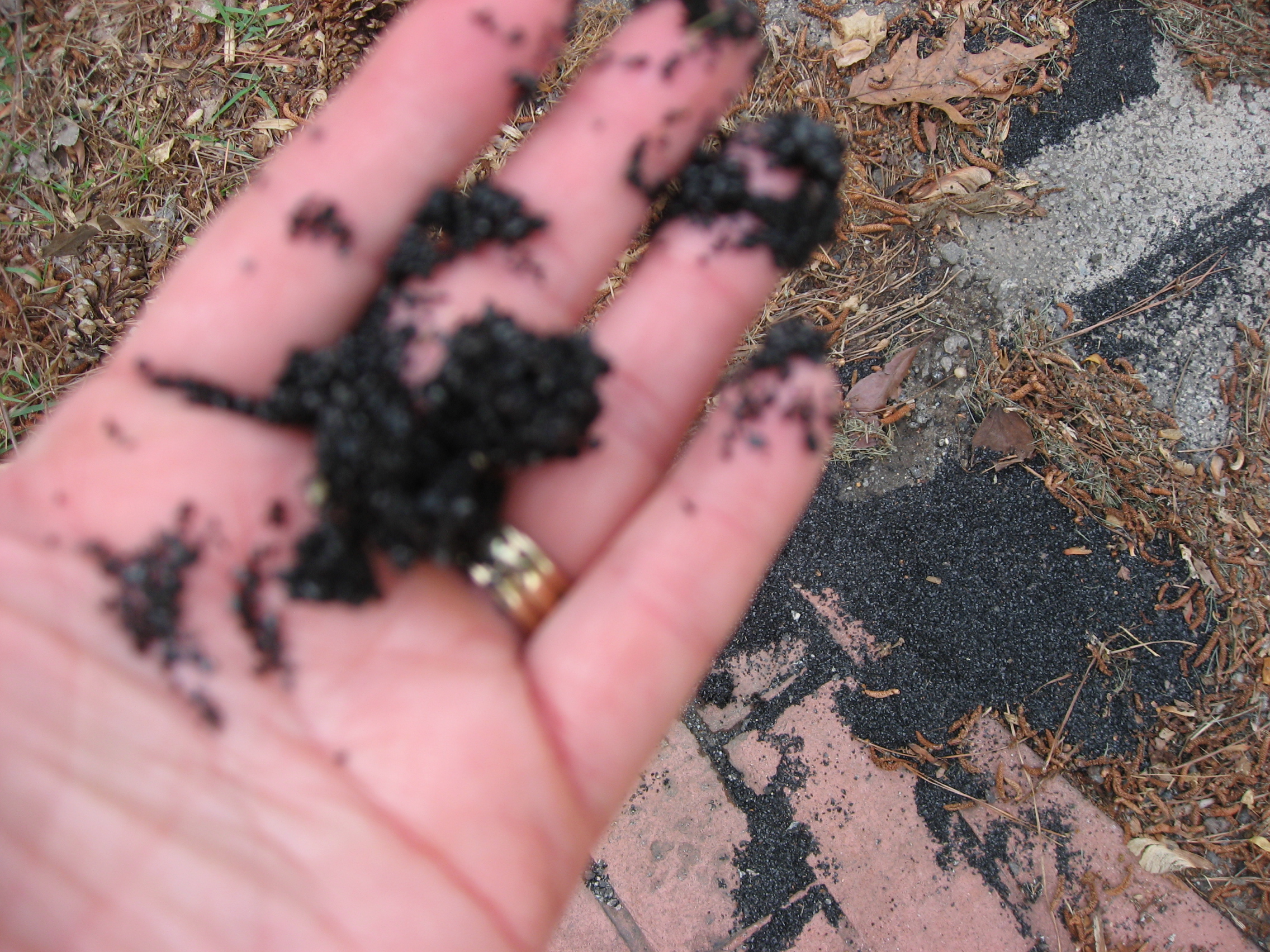 Carbon at the end of makeshift drain during repairs