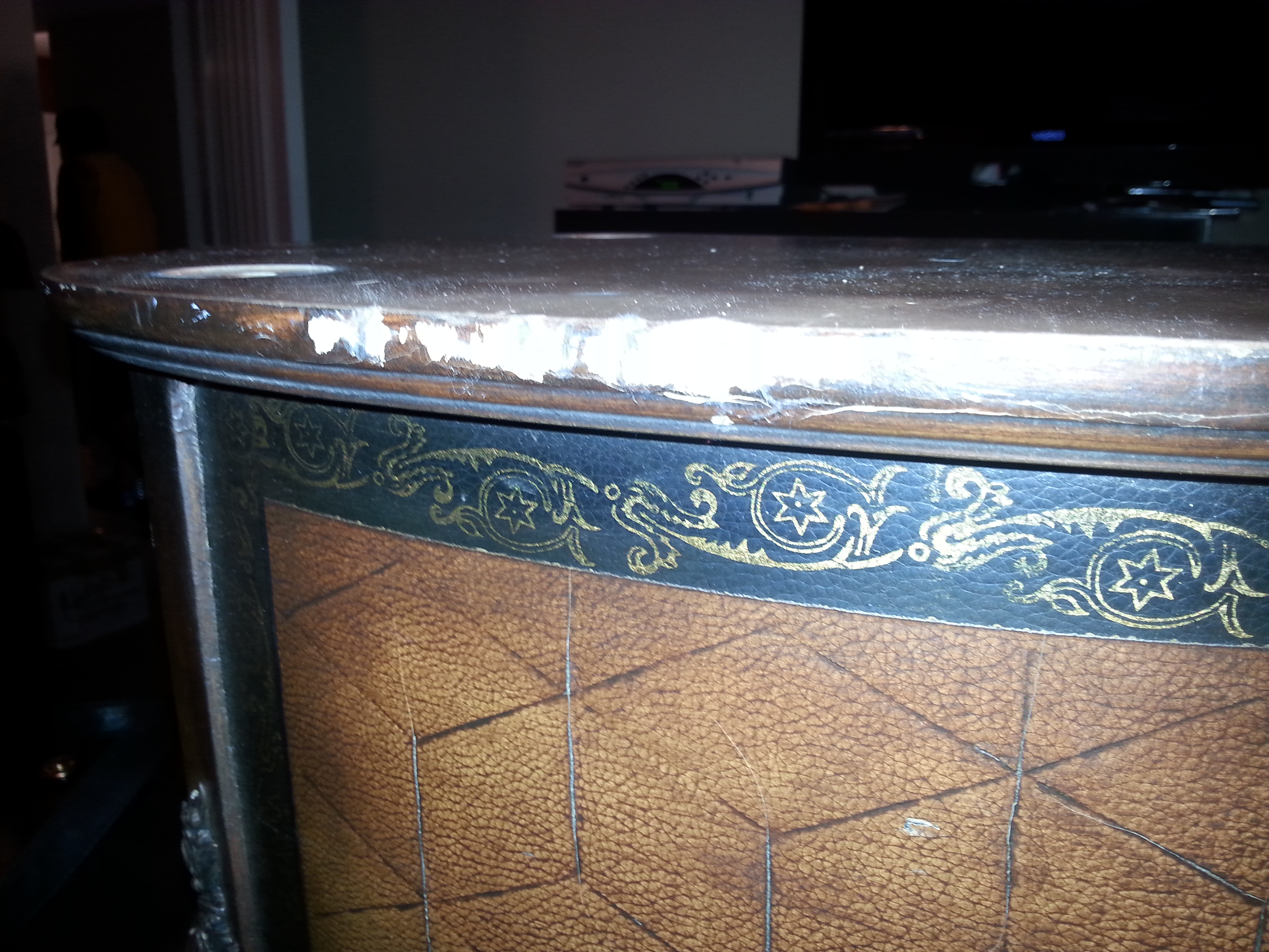Damage to an antique table