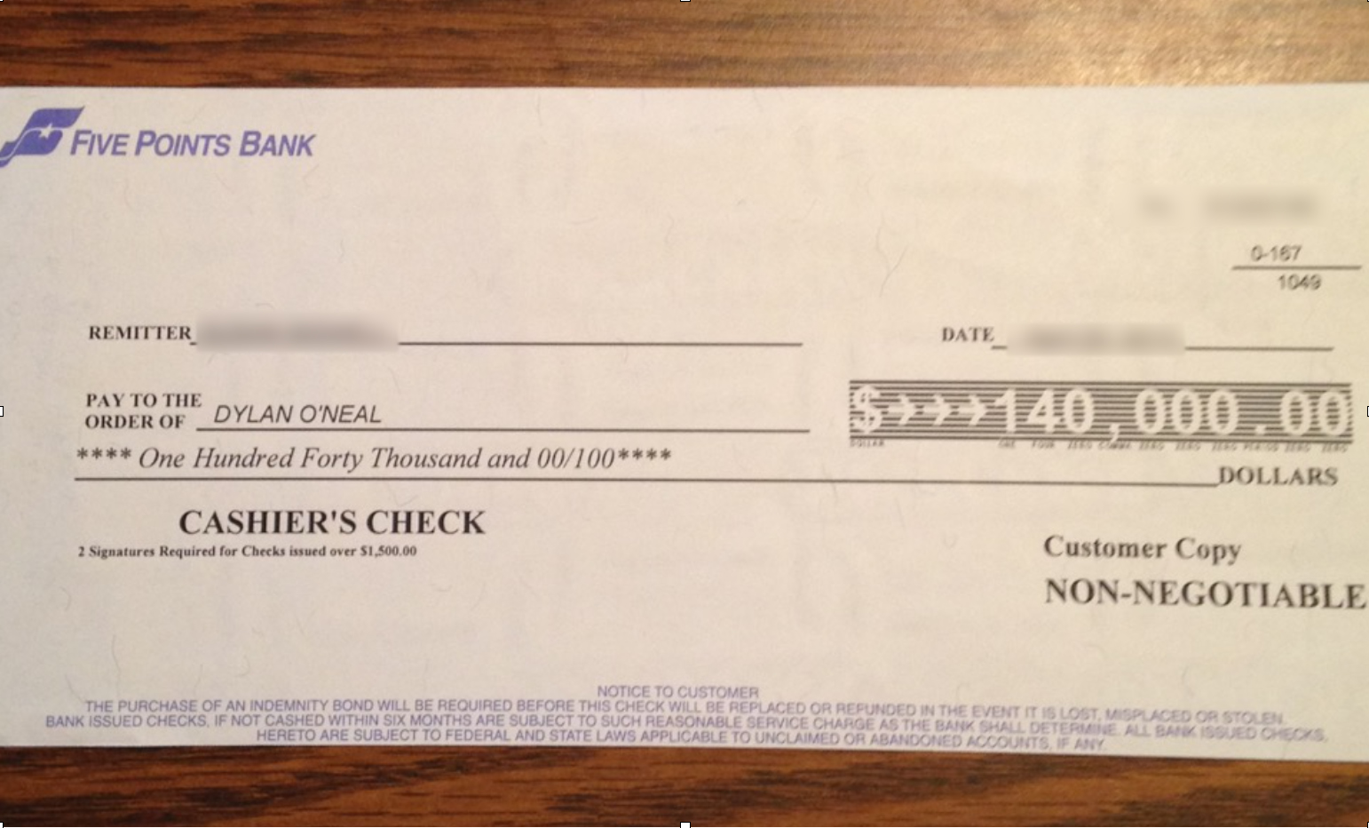 $140,000 USD cashier's check to Dylan O'Neal