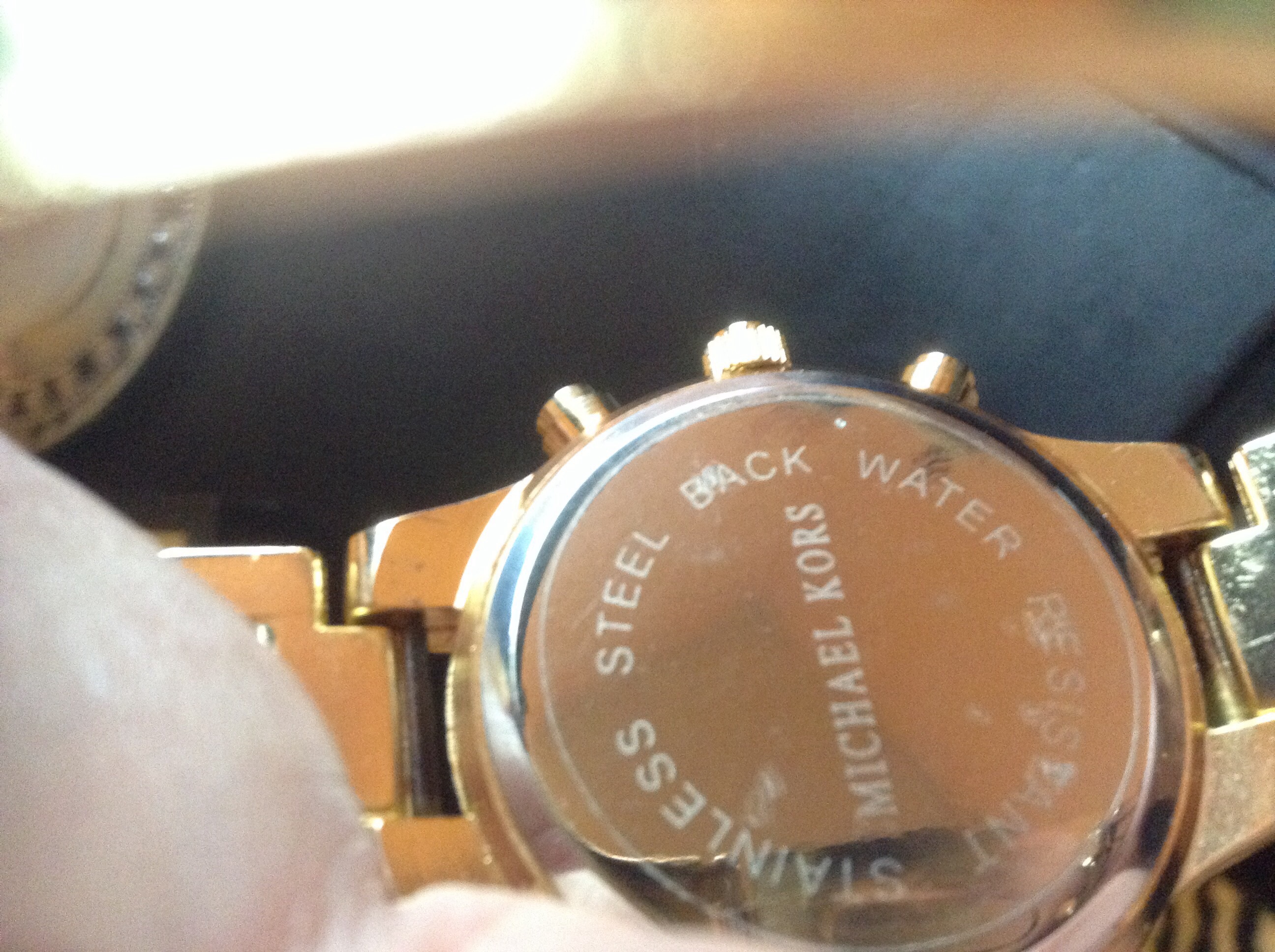 Back of watch which shows thevAuthenticity