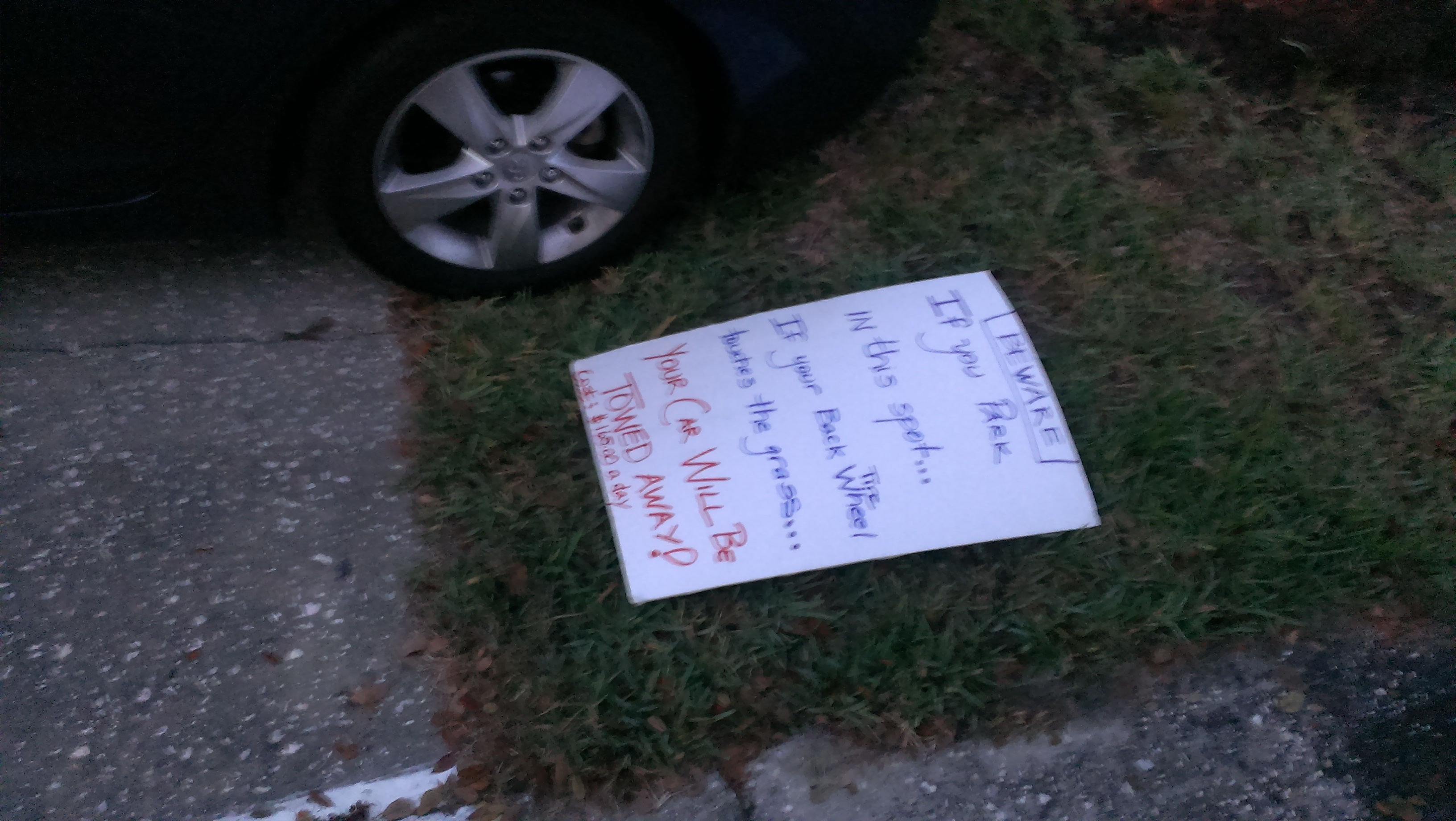 BEWARE...IF you park in this spot...  IF your Back wheel Tire touches the grass...   YOUR CAR WILL BE TOWED AWAY!!!!  Cost $165.00 to $215.00 to get your car back.  Harbour Walk WILL call towing compa