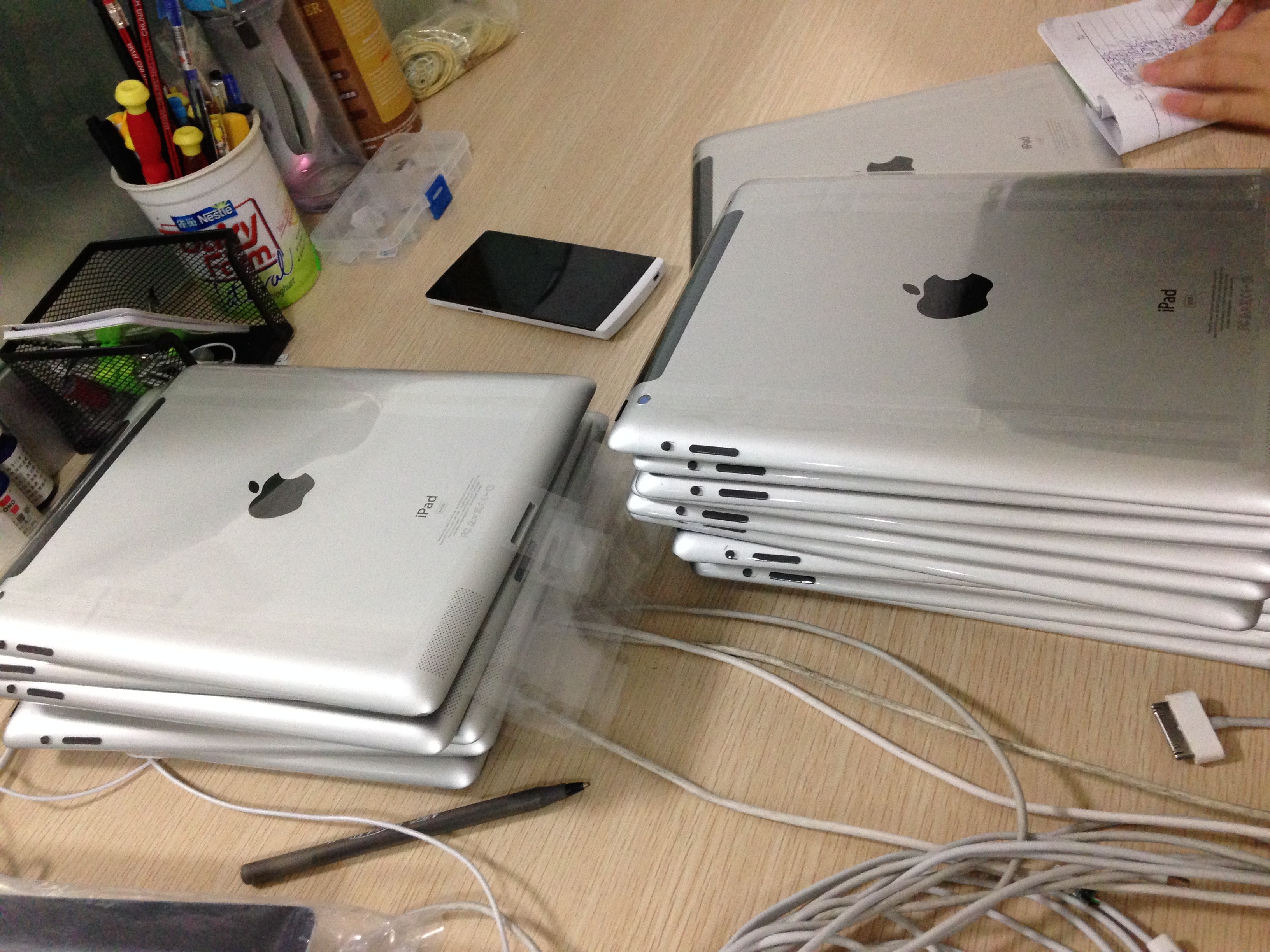 Images of Ipads, notebooks, laptops