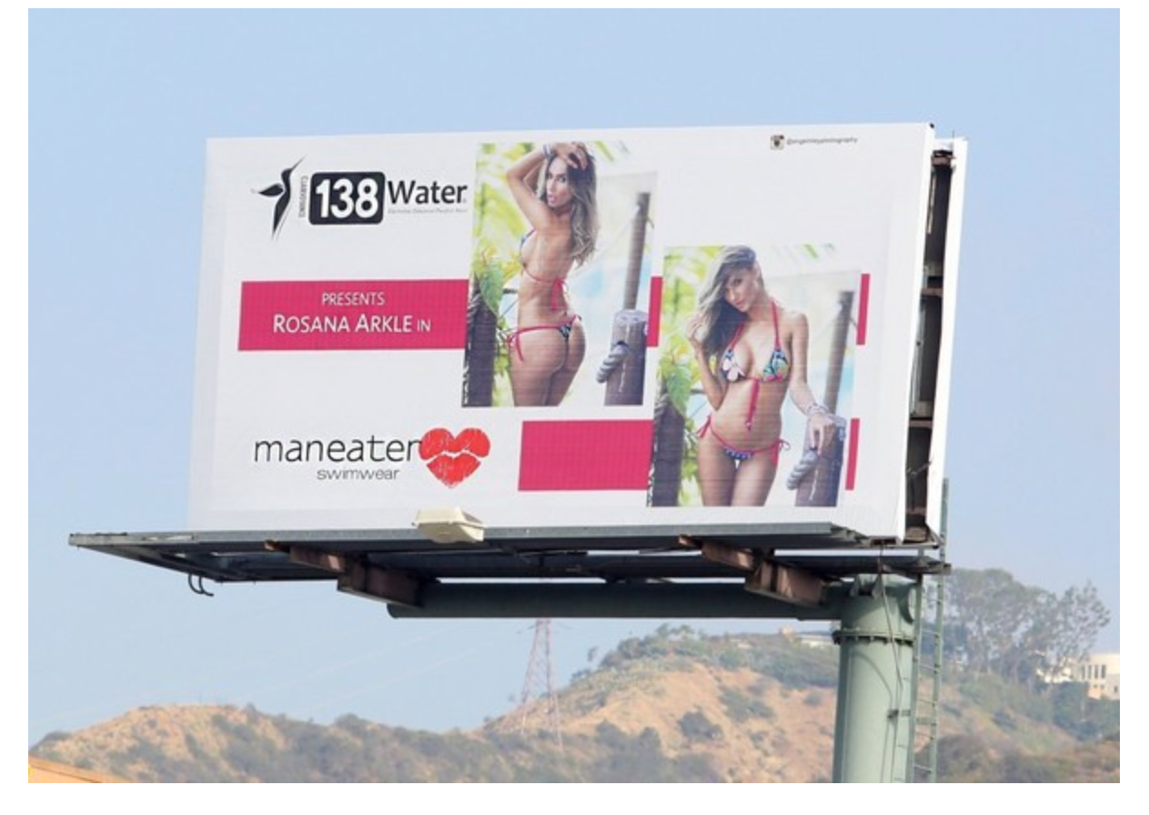 Renay Wells of Maneater Swimwear / billboards Display from Campaign she never paid for, defaulting on contract and breaching business agreement.