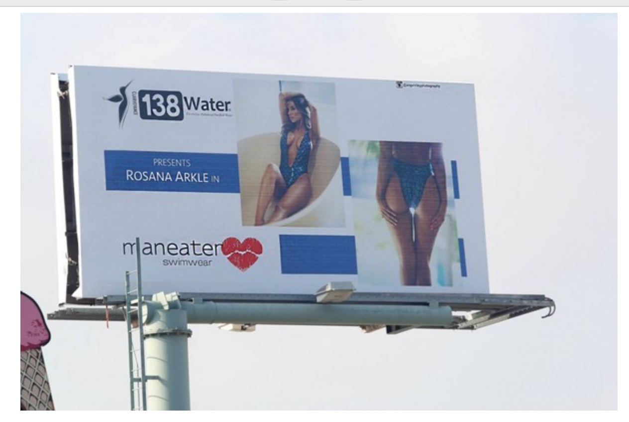 Renay Wells of Maneater Swimwear / billboards Display from Campaign she never paid for, defaulting on contract and breaching business agreement.