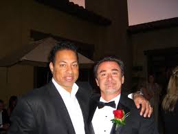 FRAUDSTER RAY ANTONIO POSING WITH A REAL PRODUCER