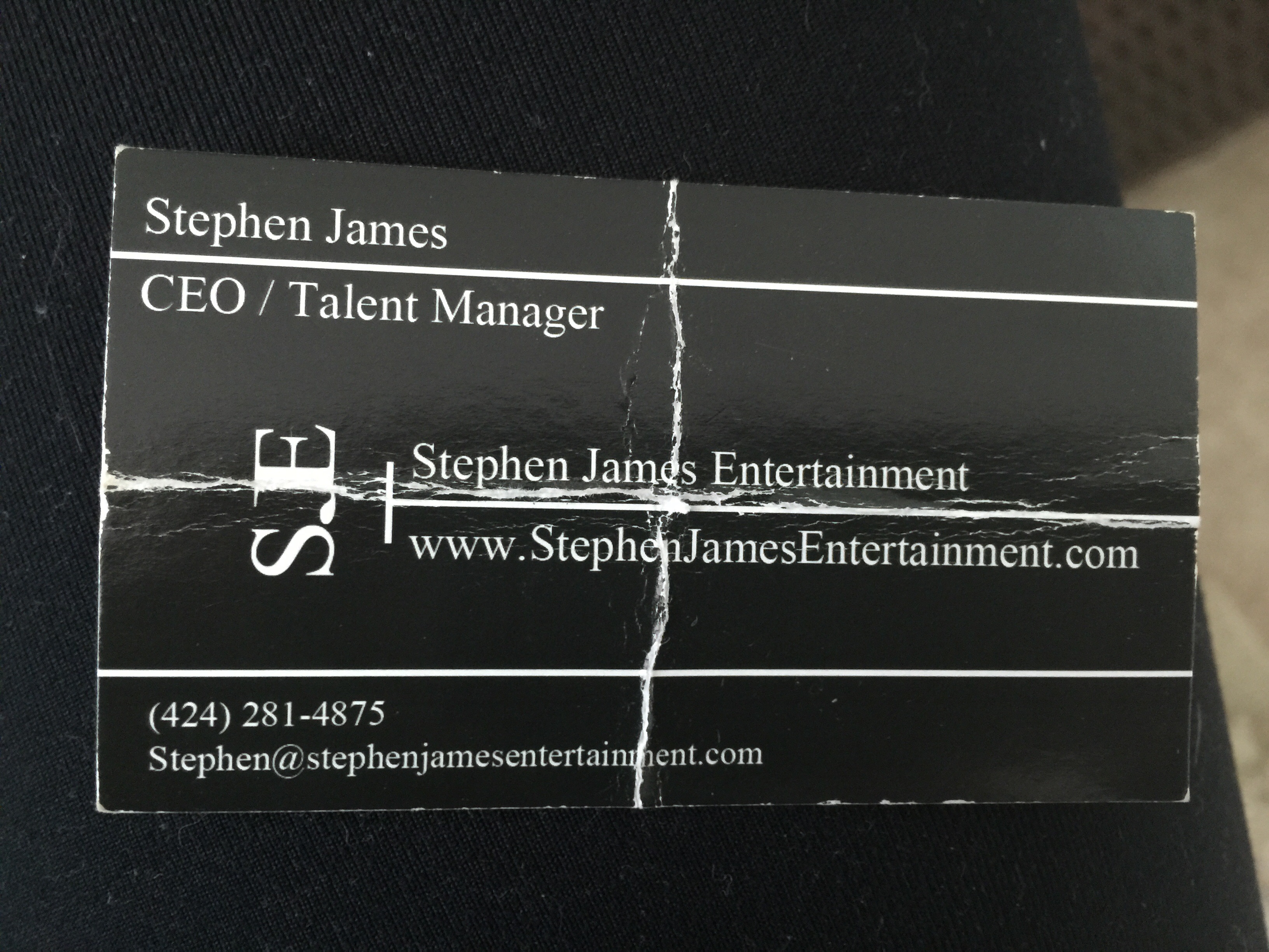 His business card