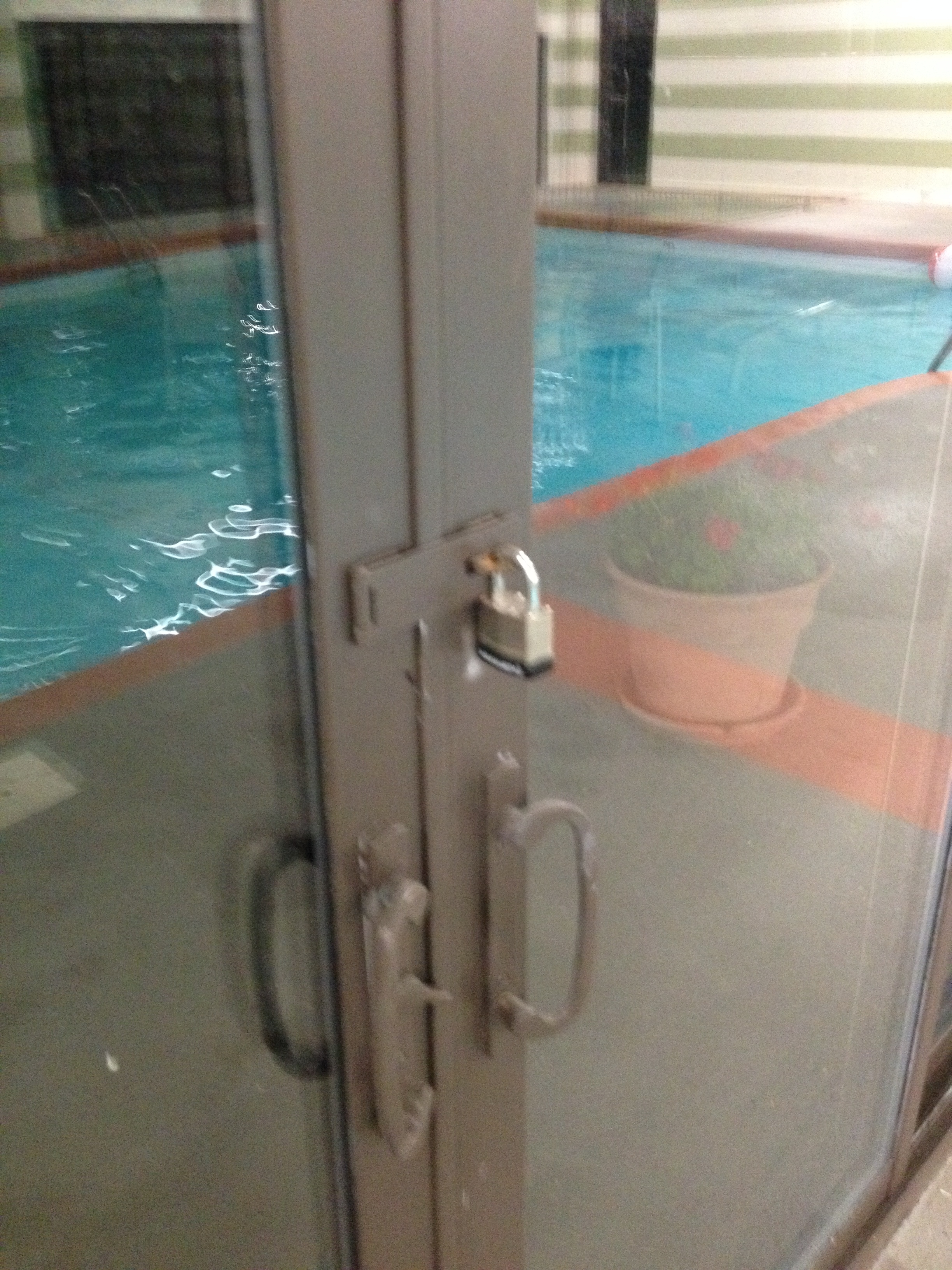 Doors to the pool building were padlocked to keep residents out.
