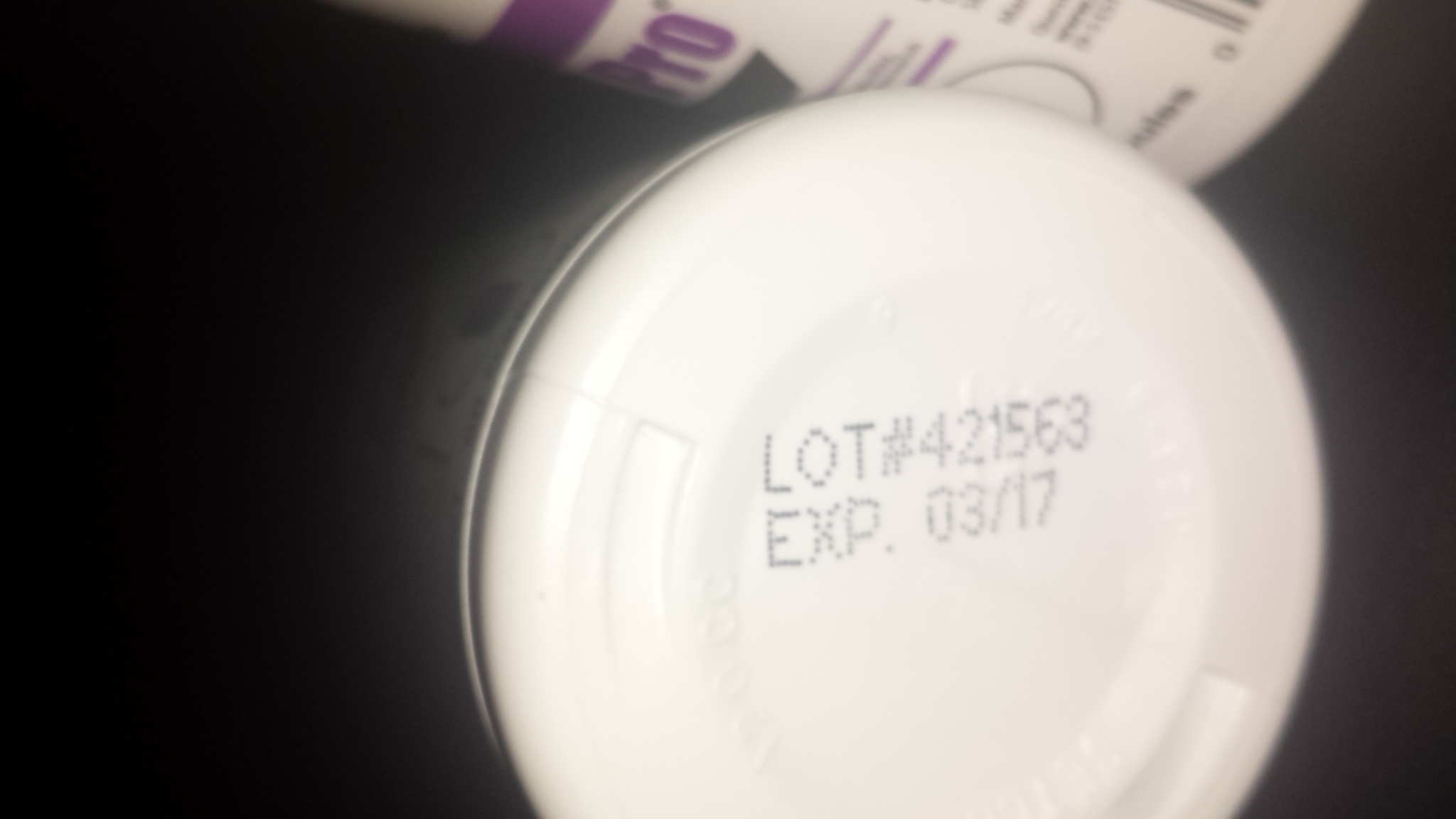 Showing lot number and expiration date. Should be printed darker.