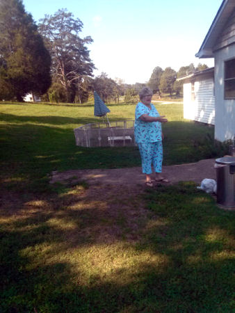 This is her denying her name is Virginia Hauber and yelling at the process server to get off her property.