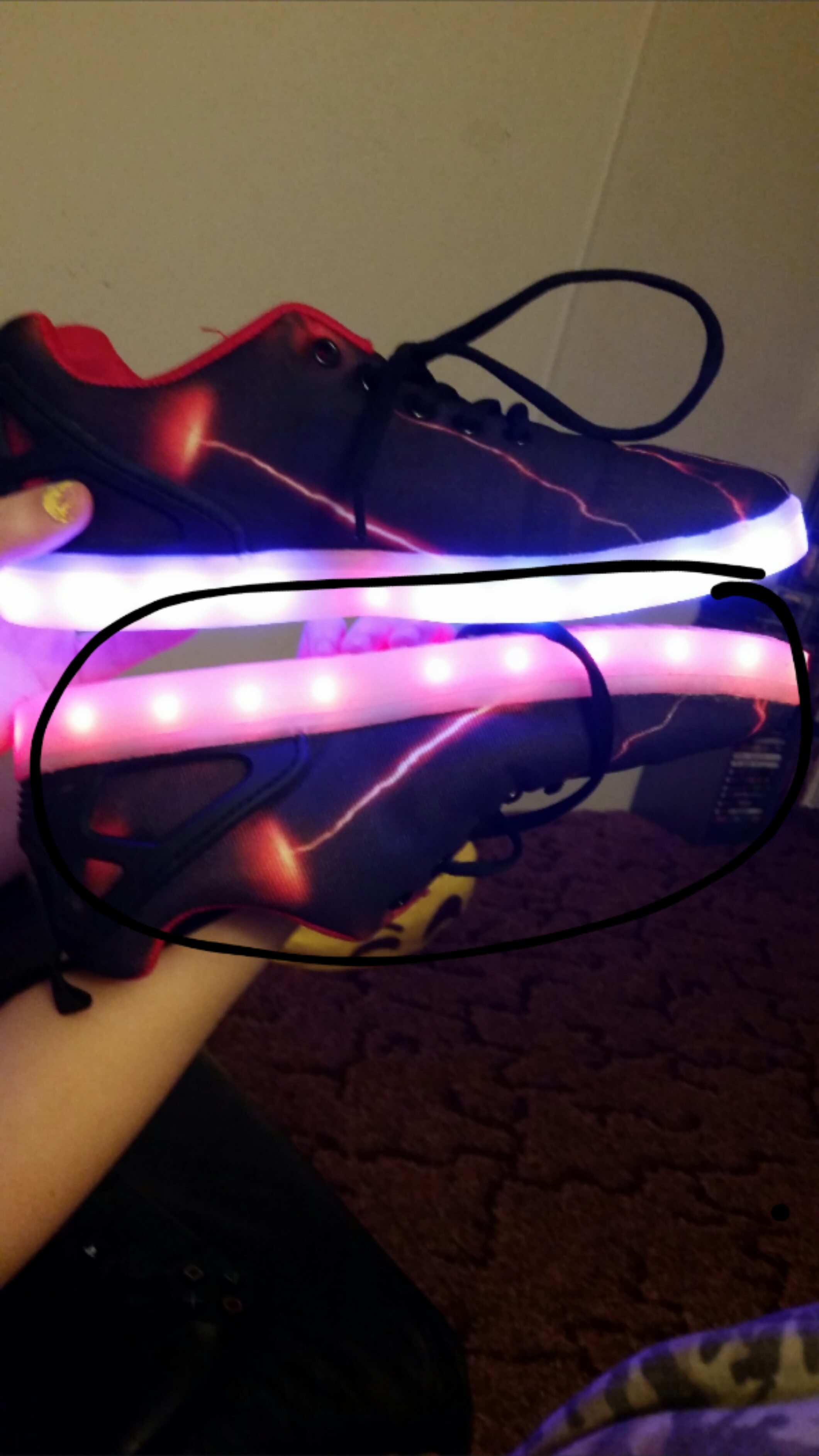 The shoe that is  circled is the one that don't turn off. And the other one has different lights when let even when we don't want them to change.