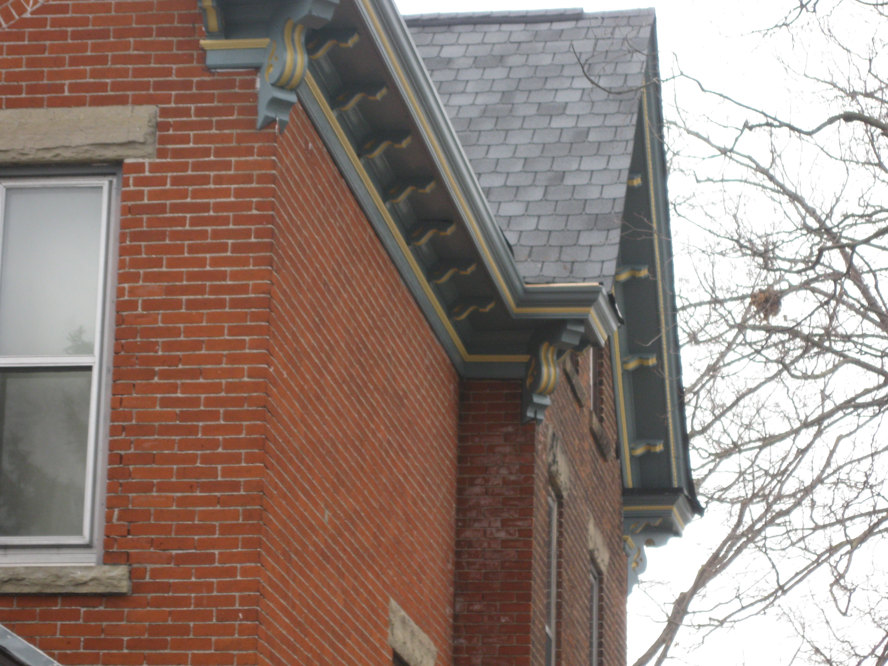 Look at the shingle tabs on the left edge. Starting at the bottom, see how they get smaller as the go up. If they would have started from the gables ends, this wouldn't have happen. Ben boys did this 