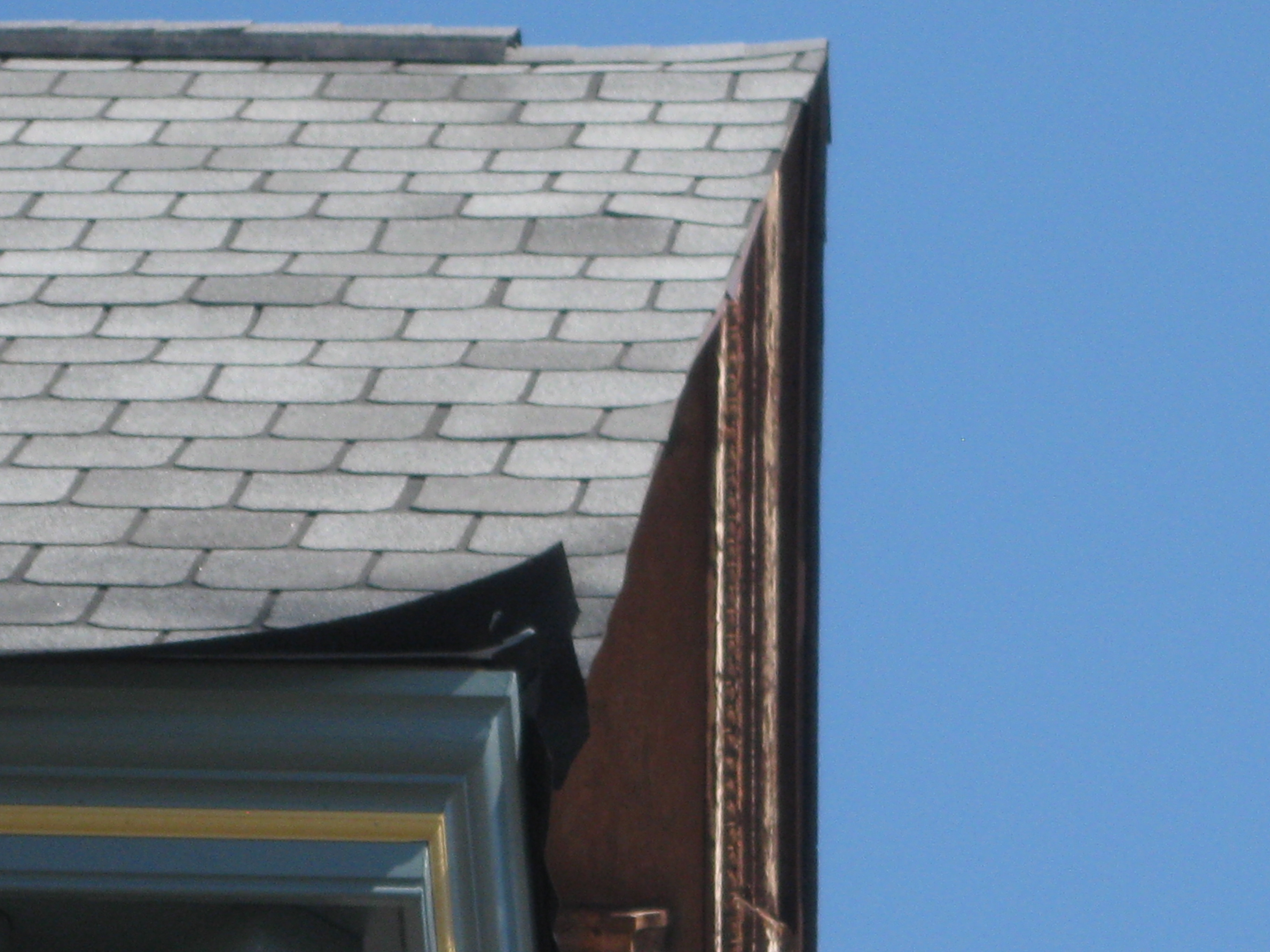 The first section of roof Sherriff-Goslin put on. We showed a copy of this photo to ten people. Two of them responded immediately by asking “Now that’s your old roof, right”. We said, “No that’s the n