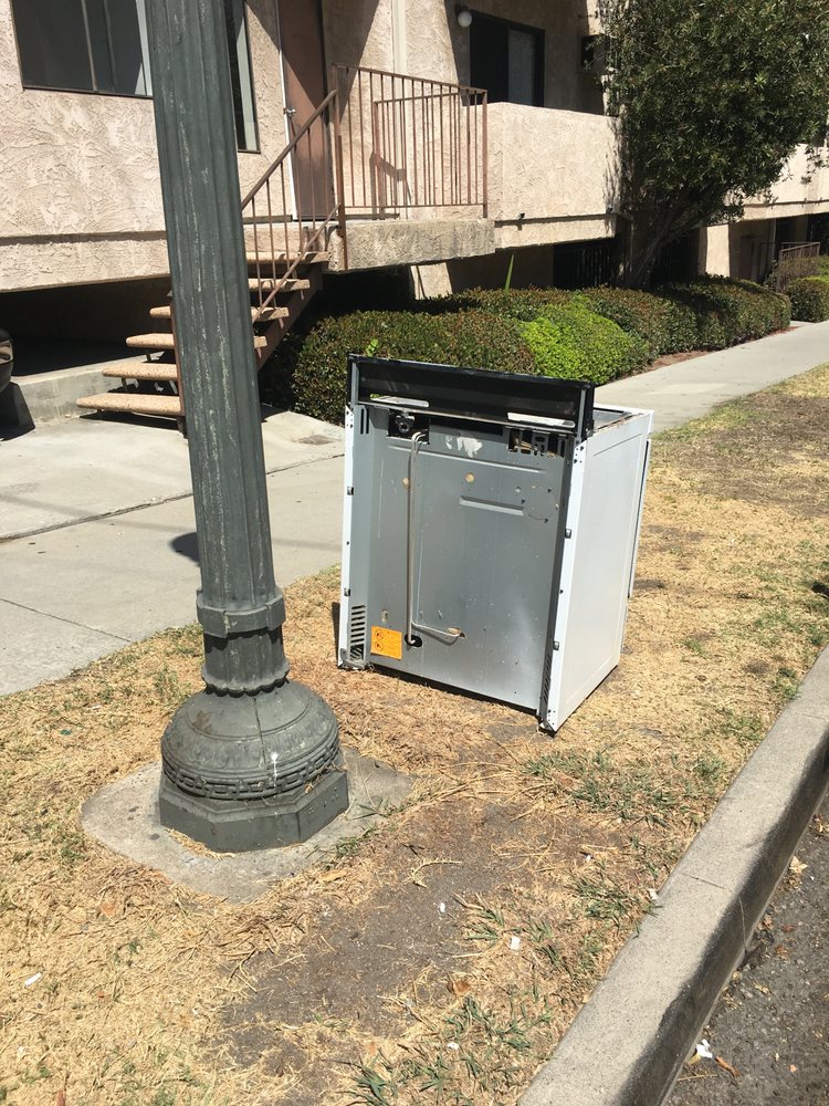 Dead lawns and Marcus P. dumps trash out front