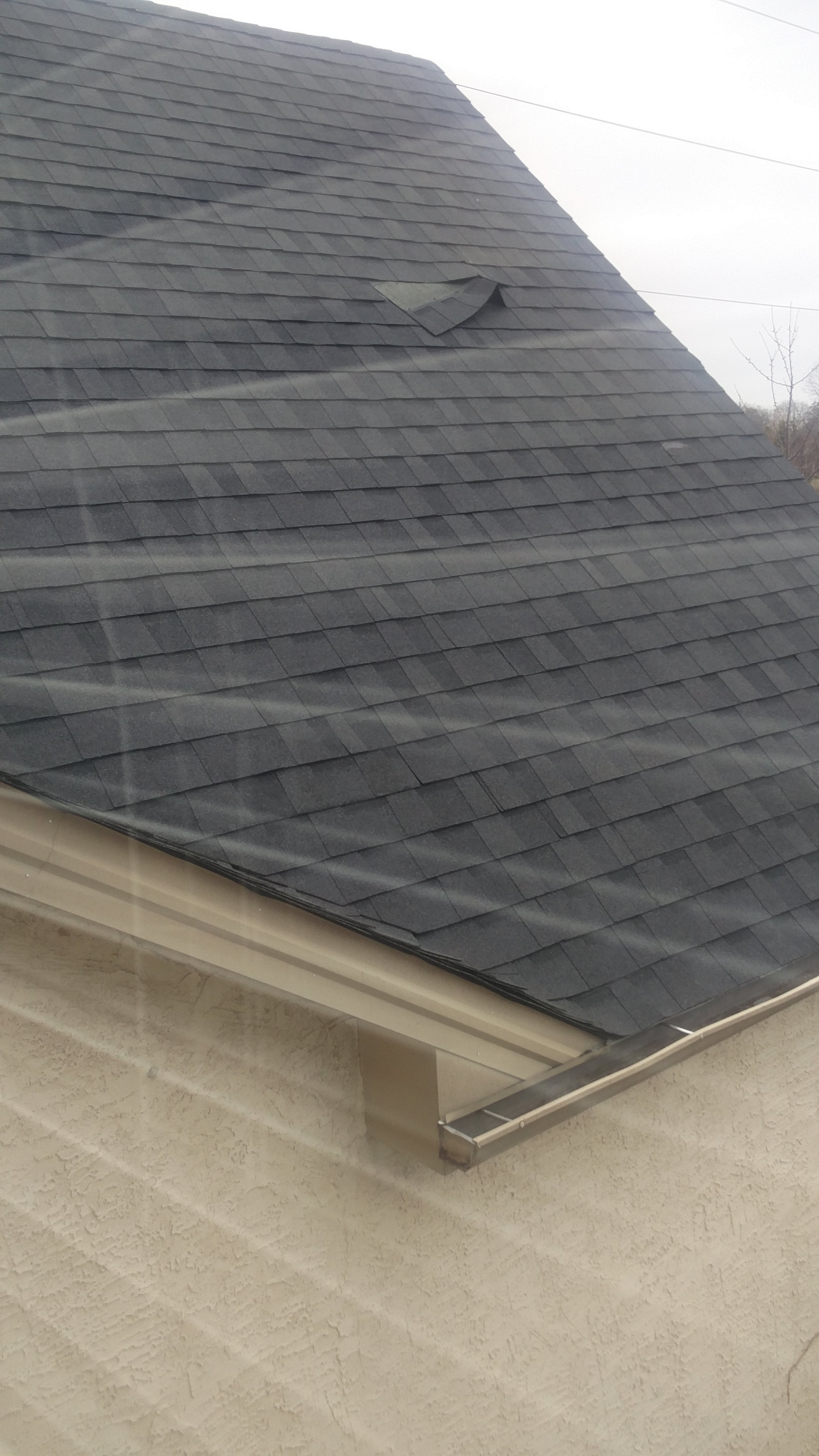Roof shingles falling off after only a month old