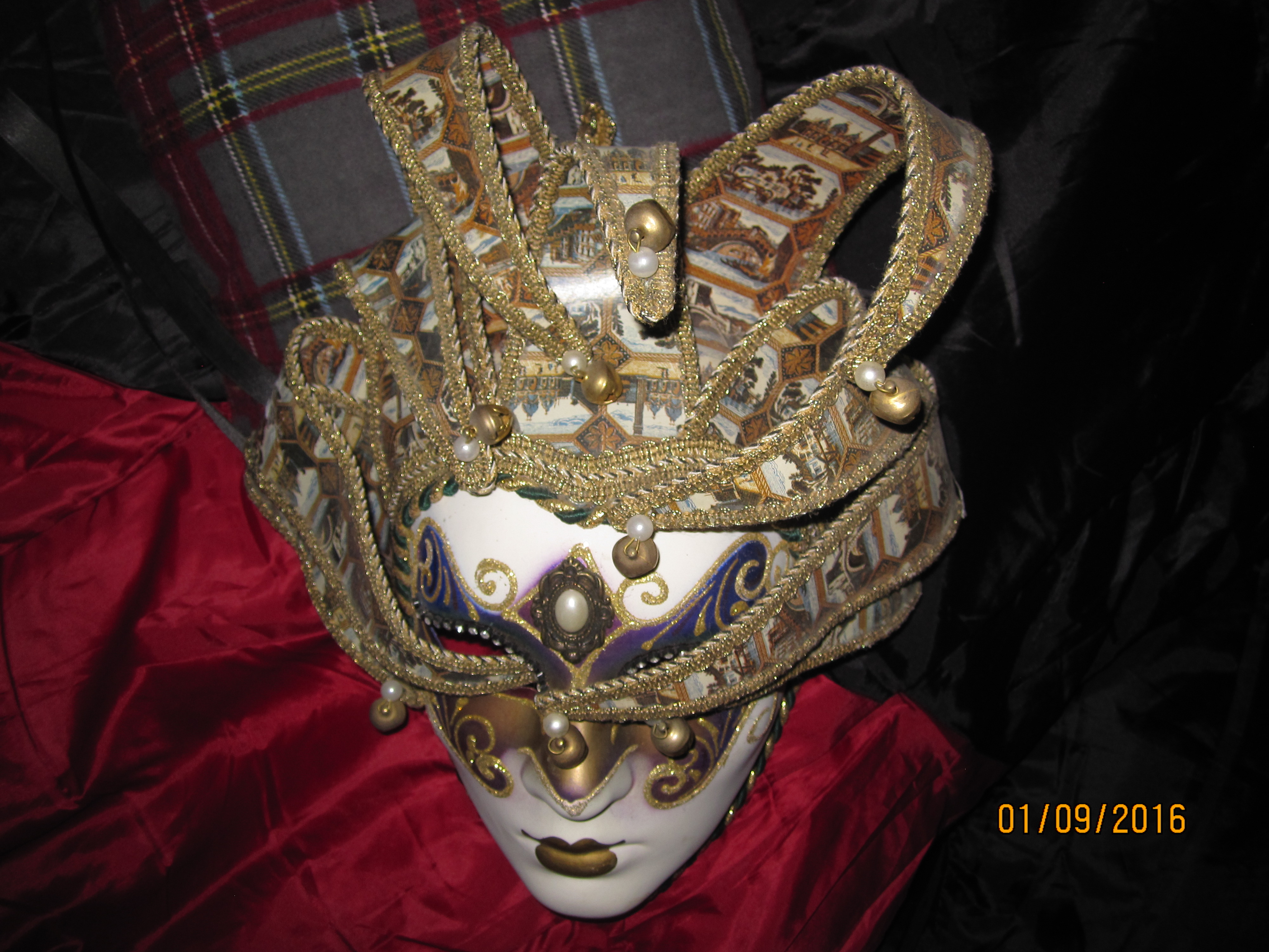 Our mask from Venice which had made it through backpacking Europe, & 4 other moves