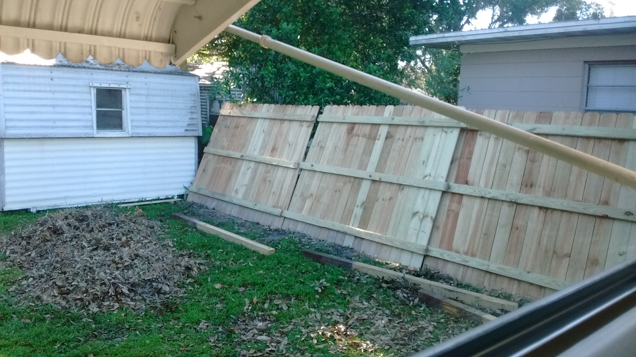 As they removed the fence they leaned it up against my neighbor's fence. What the hell.