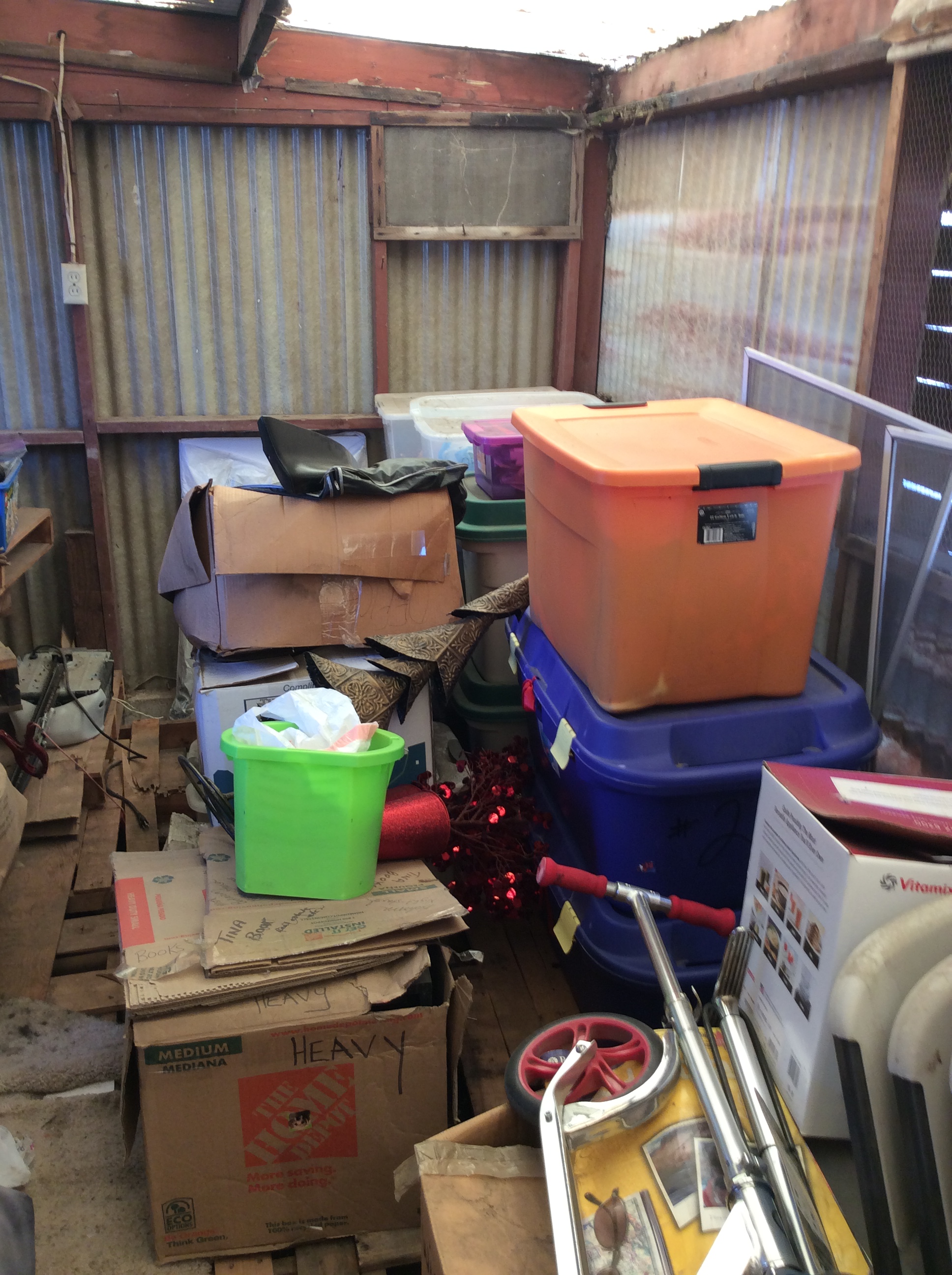 The two large blue bins pictured were full of old family photos and family stuff, and it's all missing now.