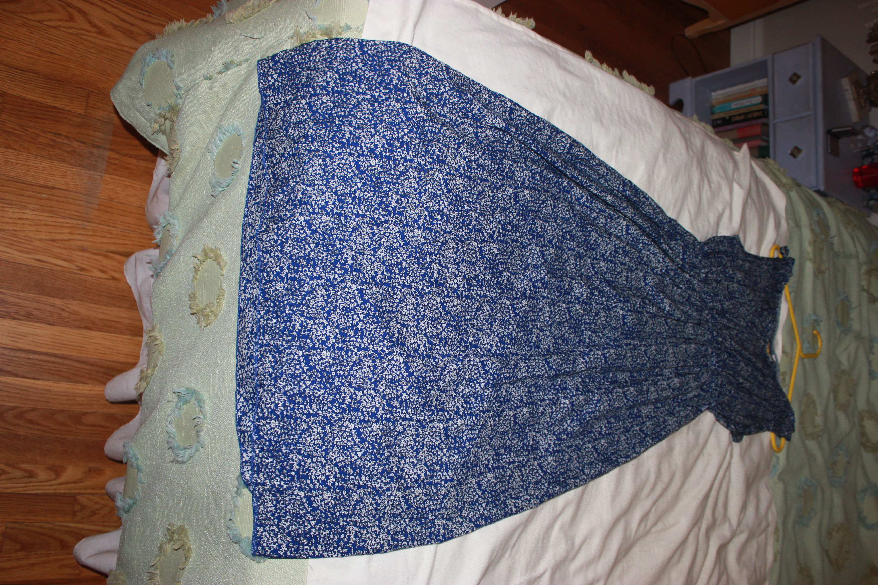 much narrower hem, cheap poly fabric, no bust room