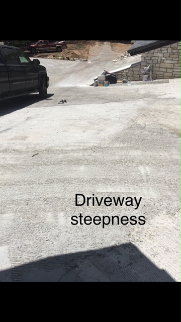  Steep driveway and discoloration on concrete 