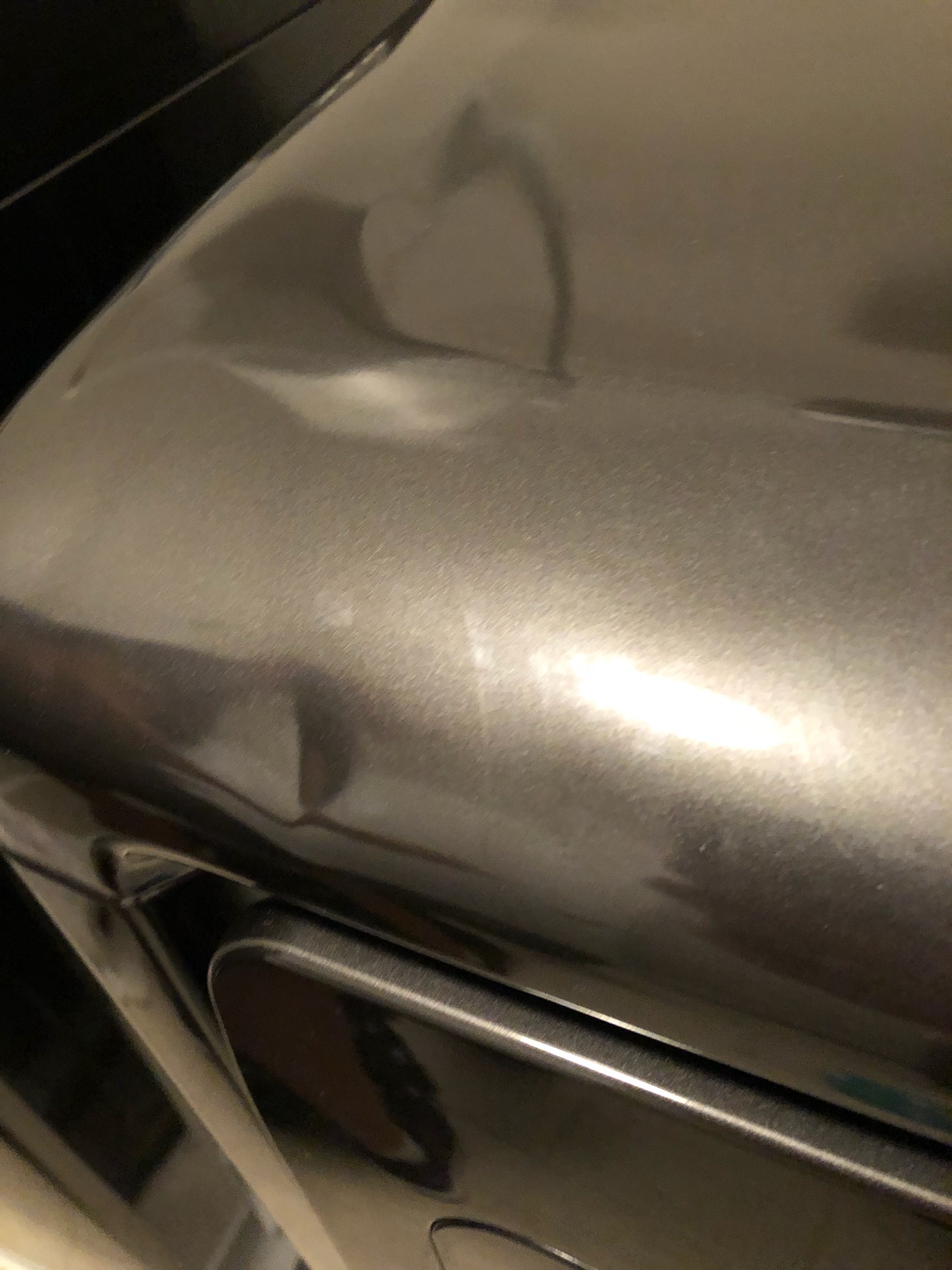 Dented steel on washer