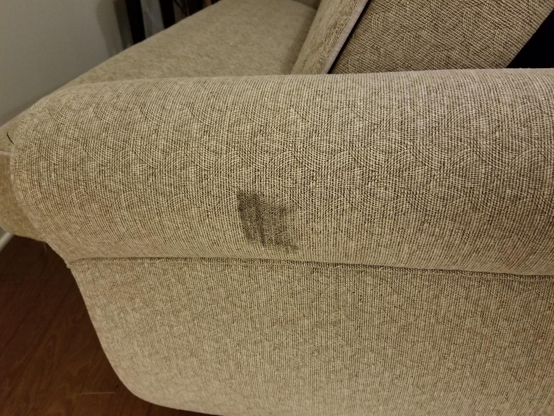 armrest with grease stain