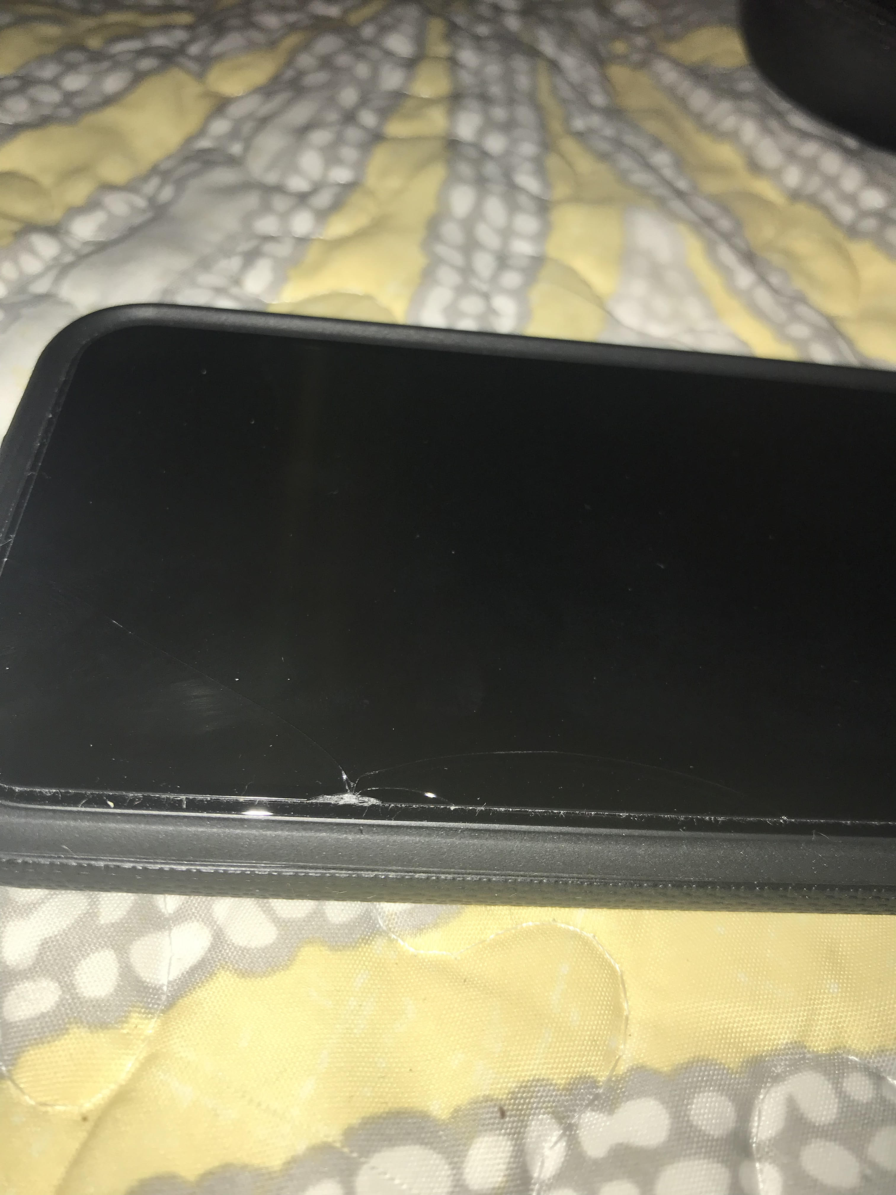 photo of a broken screen protector