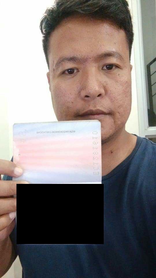 The name printed below his passport is different