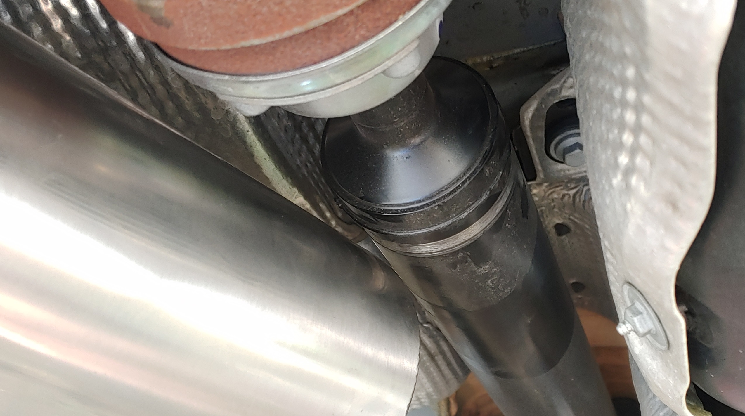 driveshaft rubbing against muffler