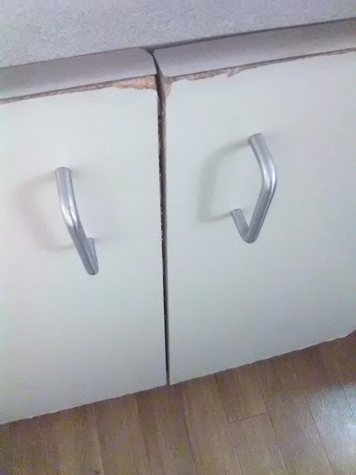 Kitchen Cabinets Flaking Apart