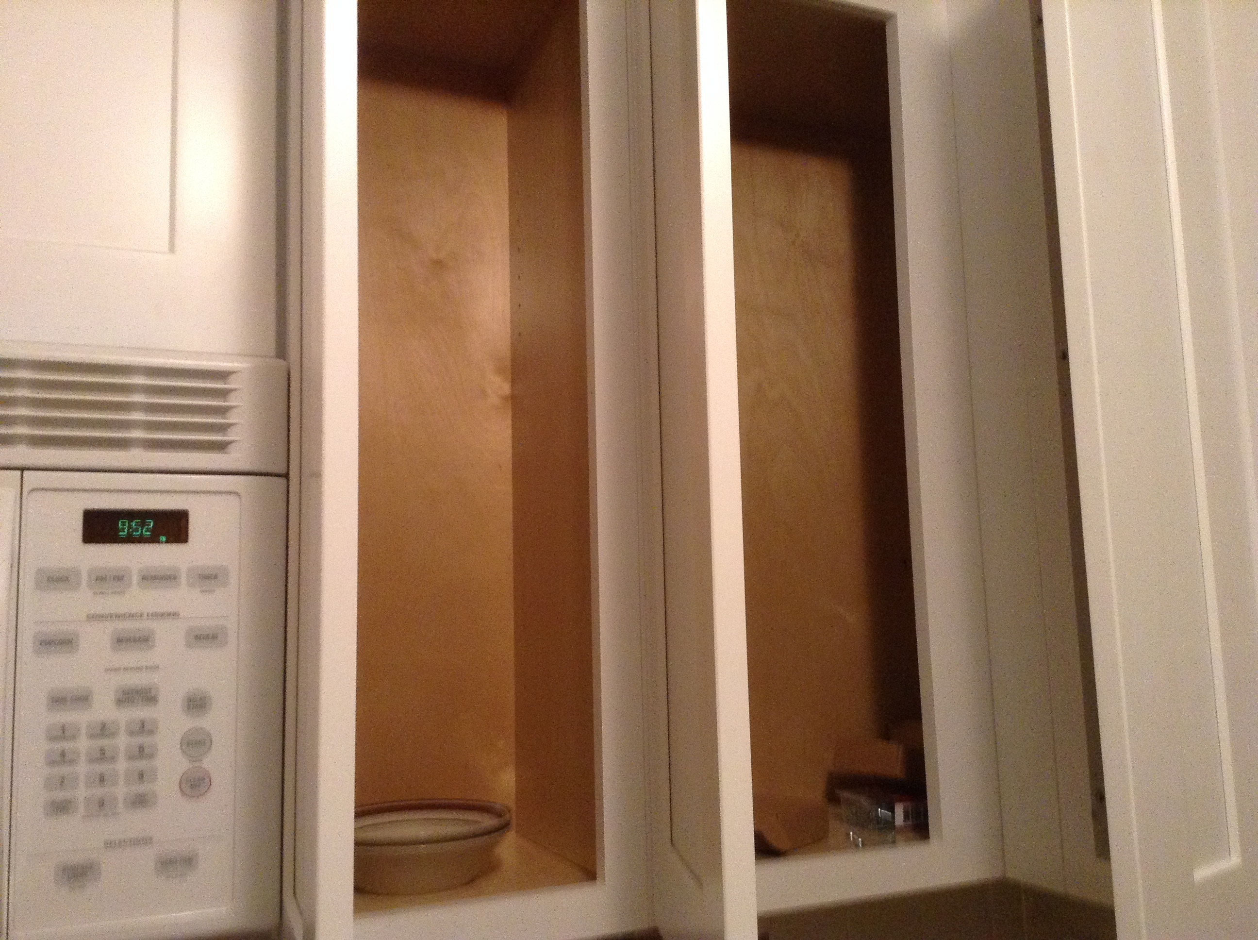 Cabinets are narrower than a size of dinner plate 