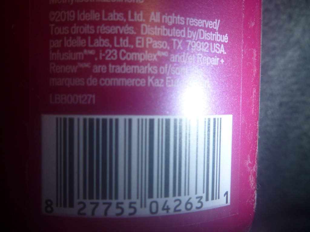 Back Side Of An Infusium Bottle Showing Proof Of Product Being Manufactured Out In Del Rio, Texas