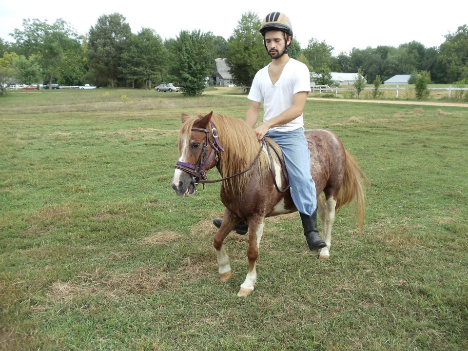 This kid is way to big for this pony. OMG how cruel to the ponies back and legs.